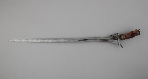 Antique Kris Sword on Gray Background
