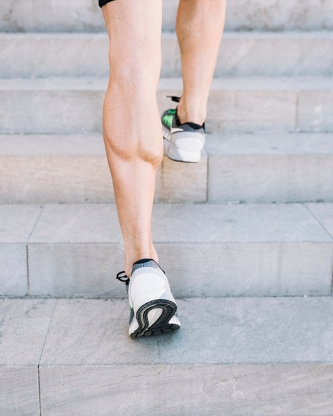 Runner Climbing Concrete Stairs