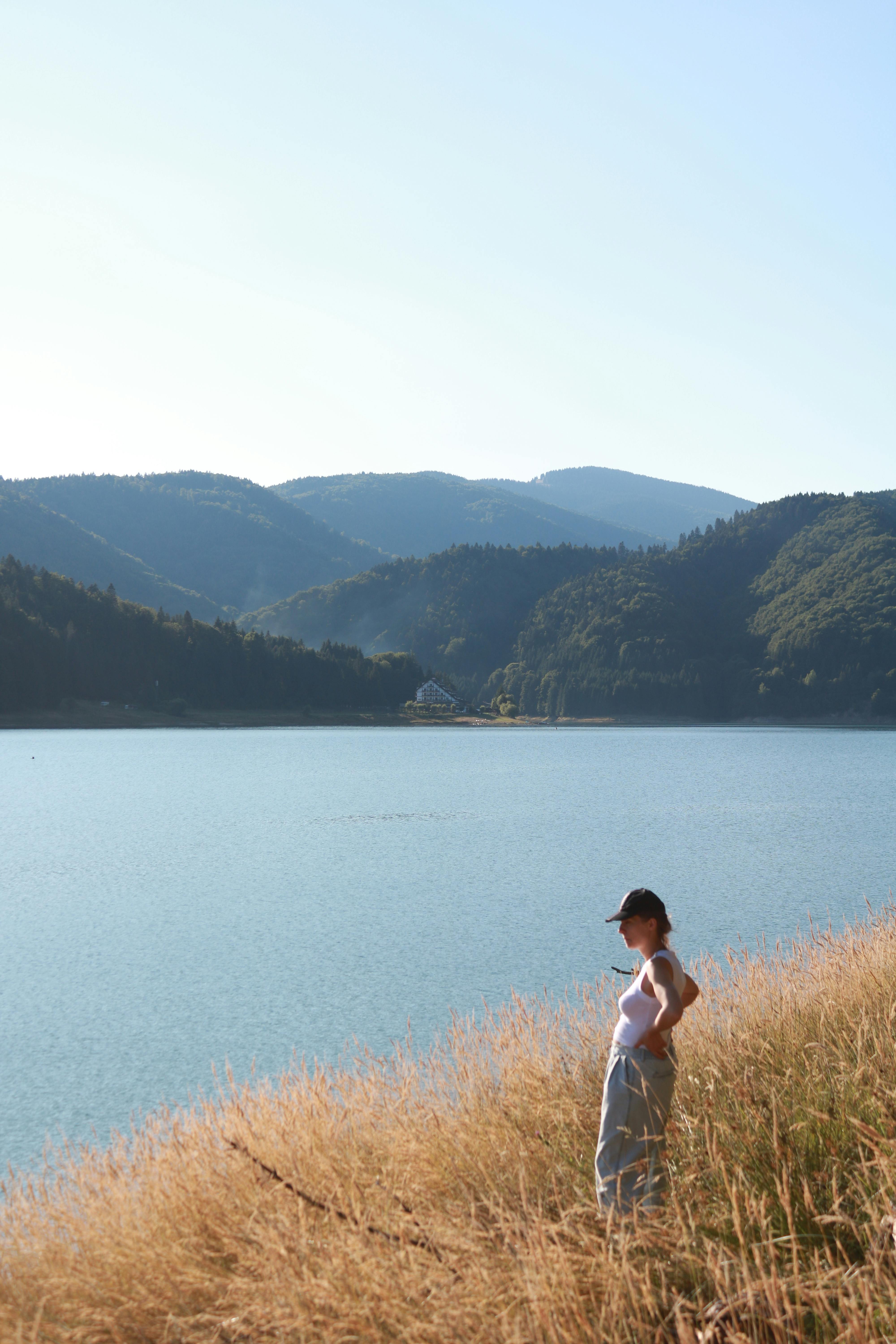 Woman Overlooking Mountain Lake
