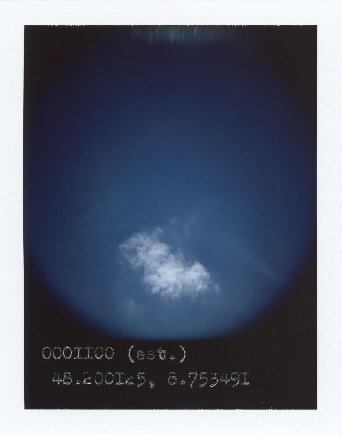 Isolated Cloud in Deep Blue Sky