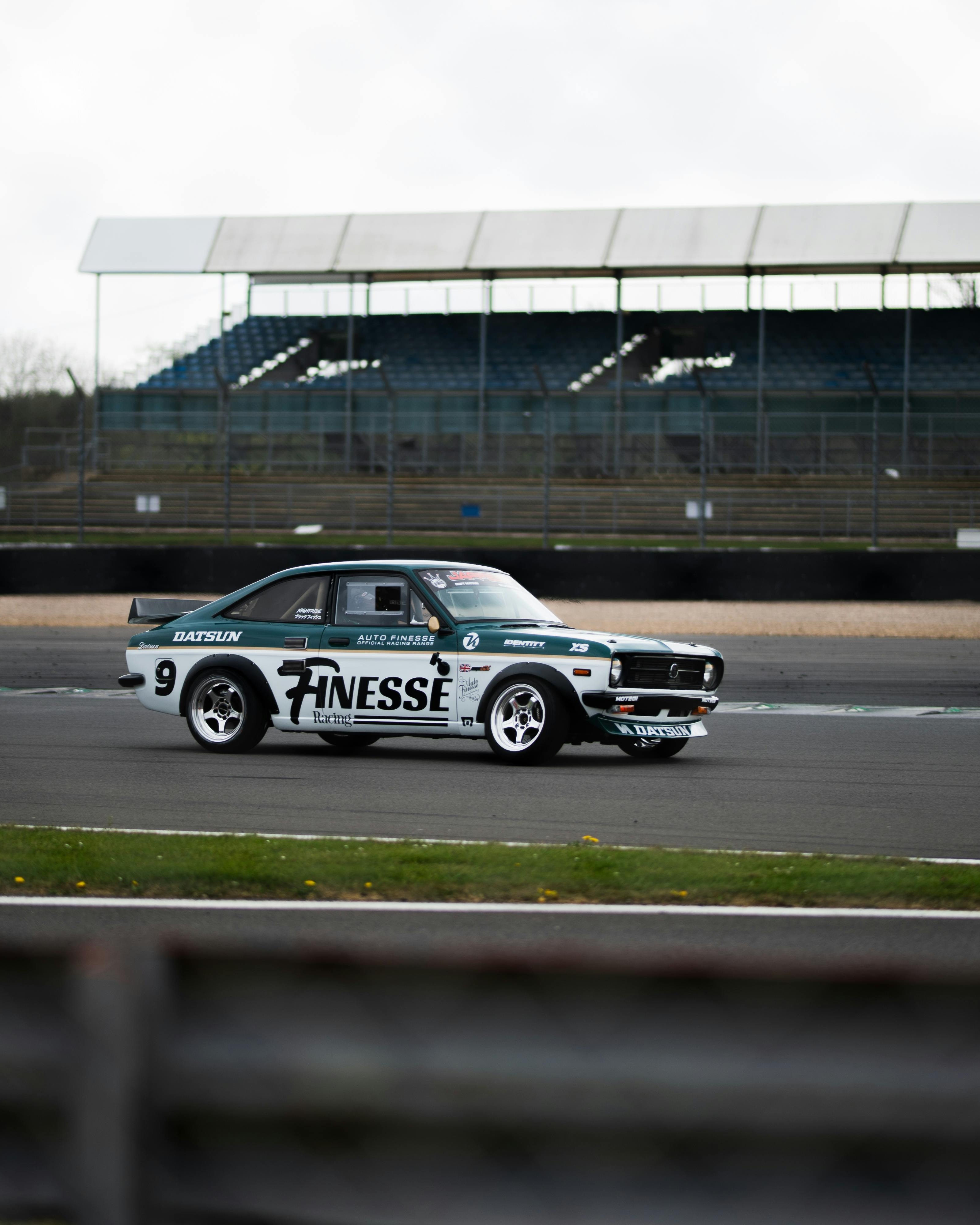 Vintage Datsun Race Car on Race Track