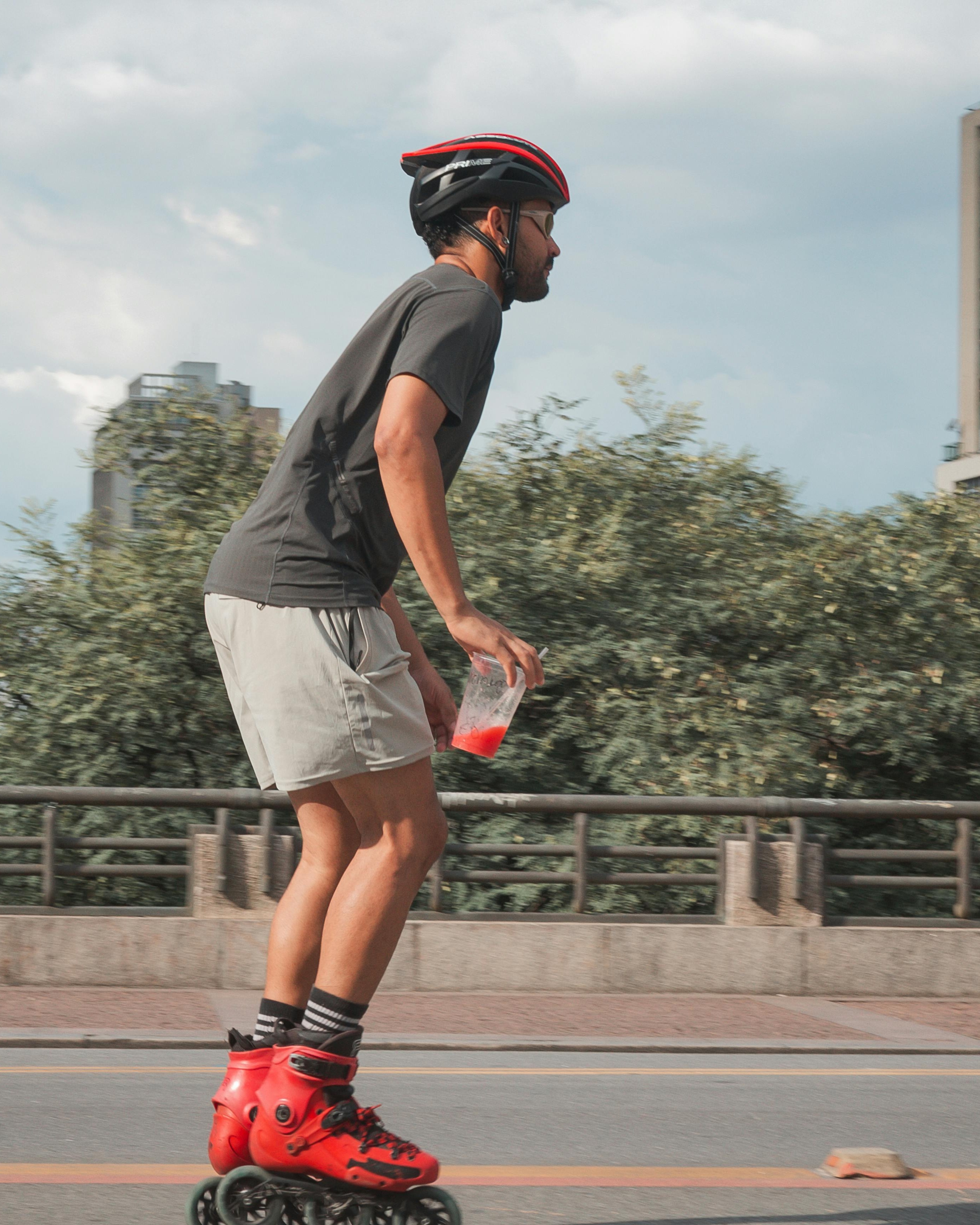 Man Inline Skating on City Road