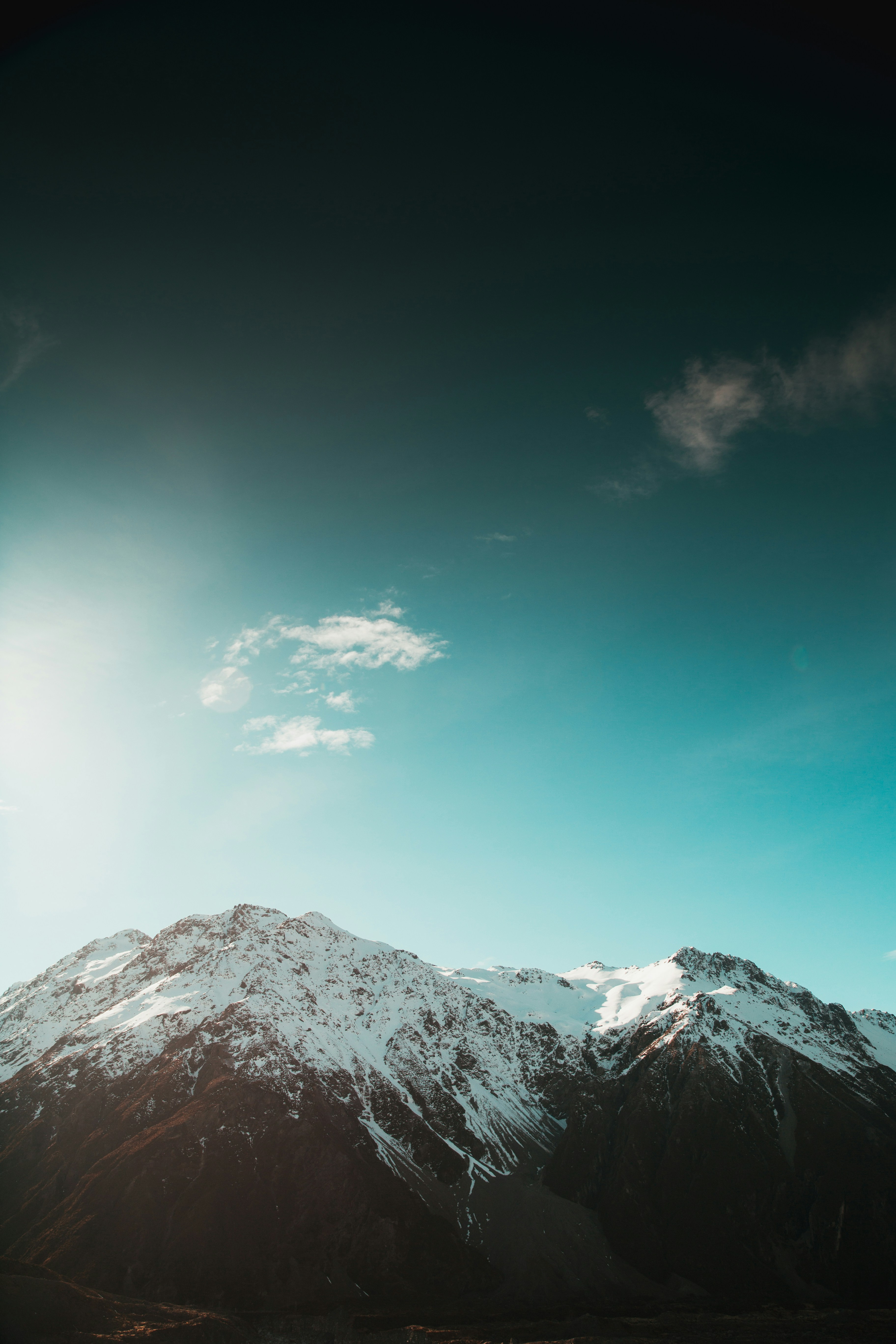 Snow-capped Mountains Under Clear Sky