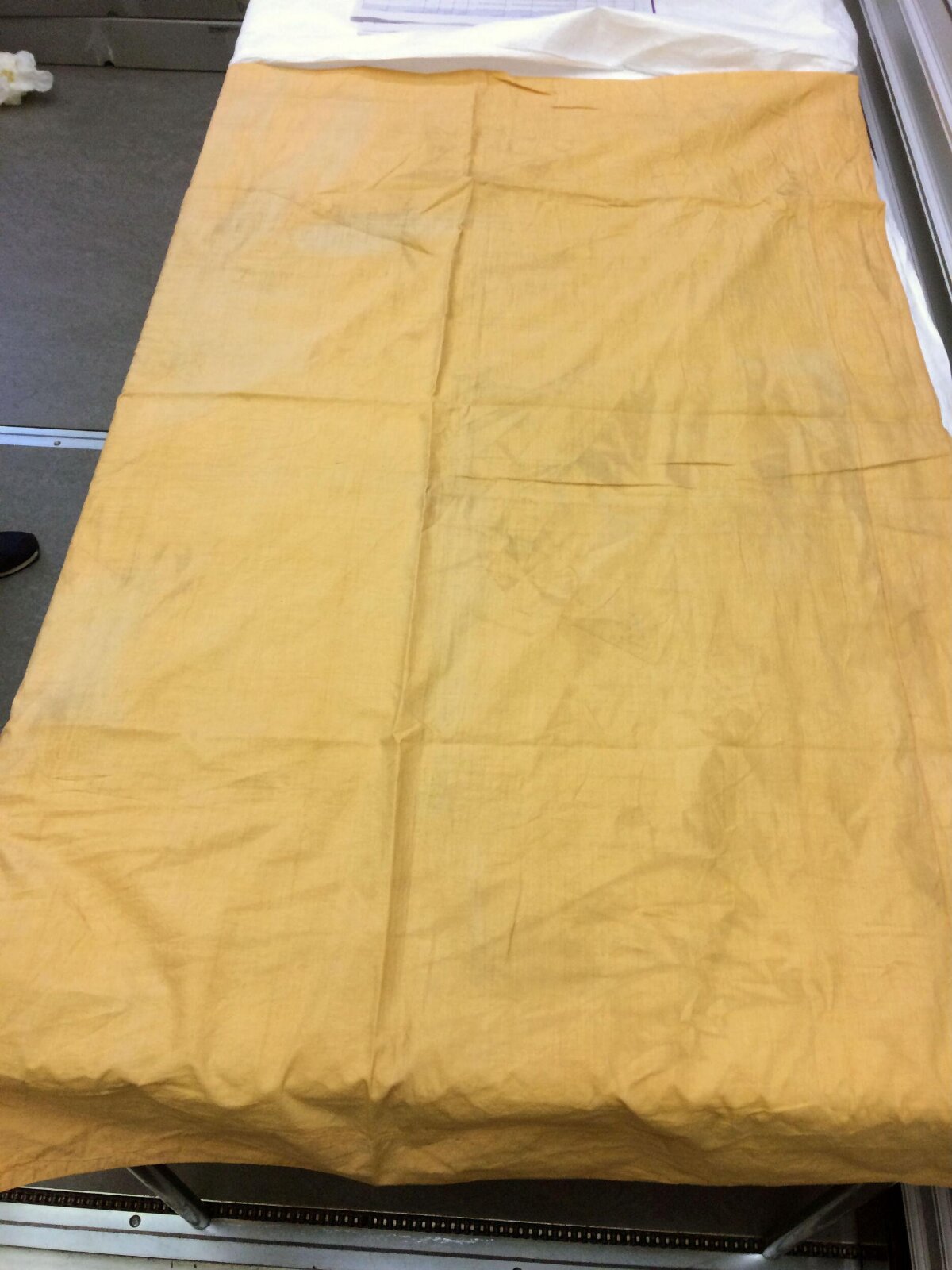Yellow Cloth on Work Table