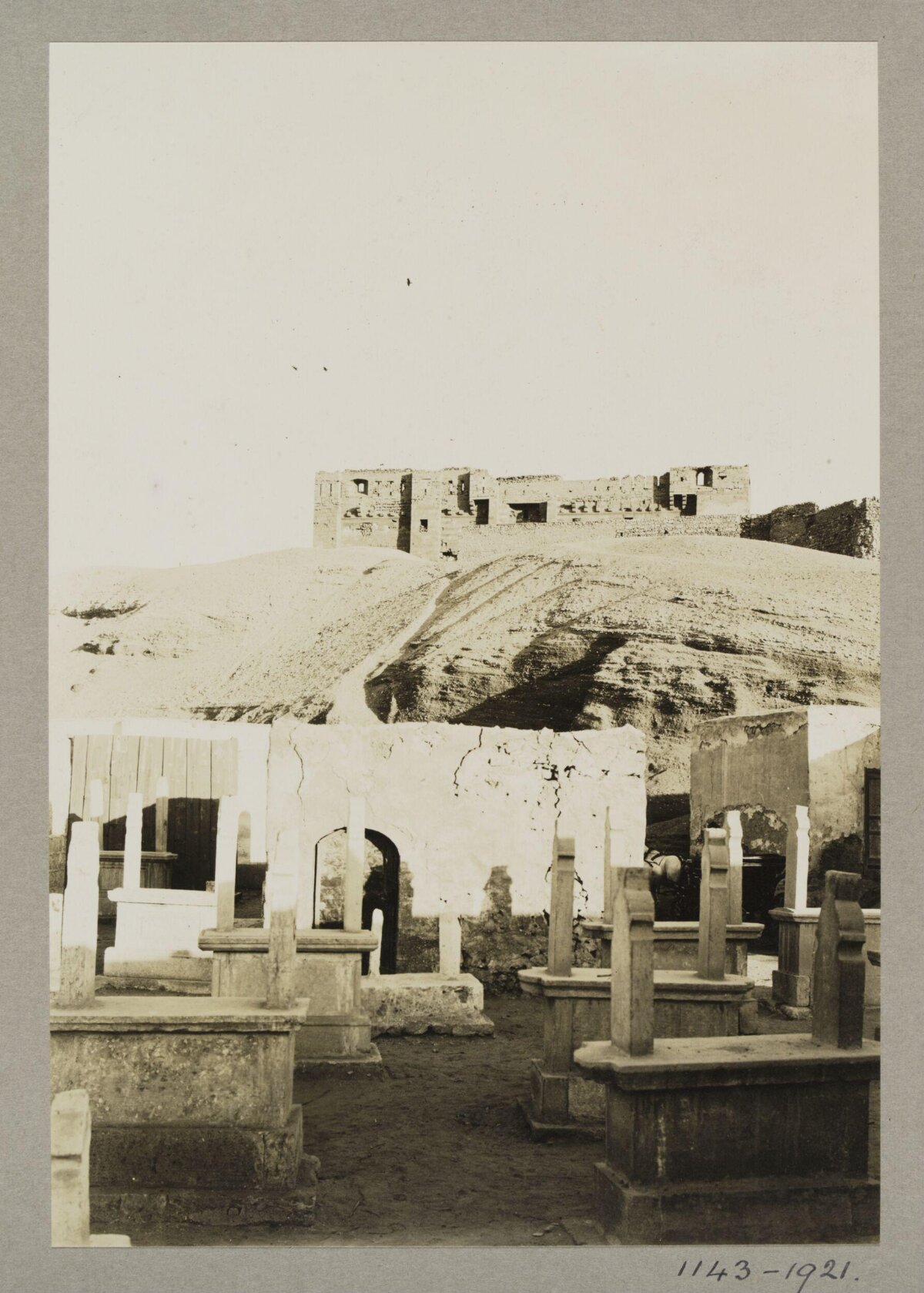 Vintage Cemetery with Hilltop Ruins
