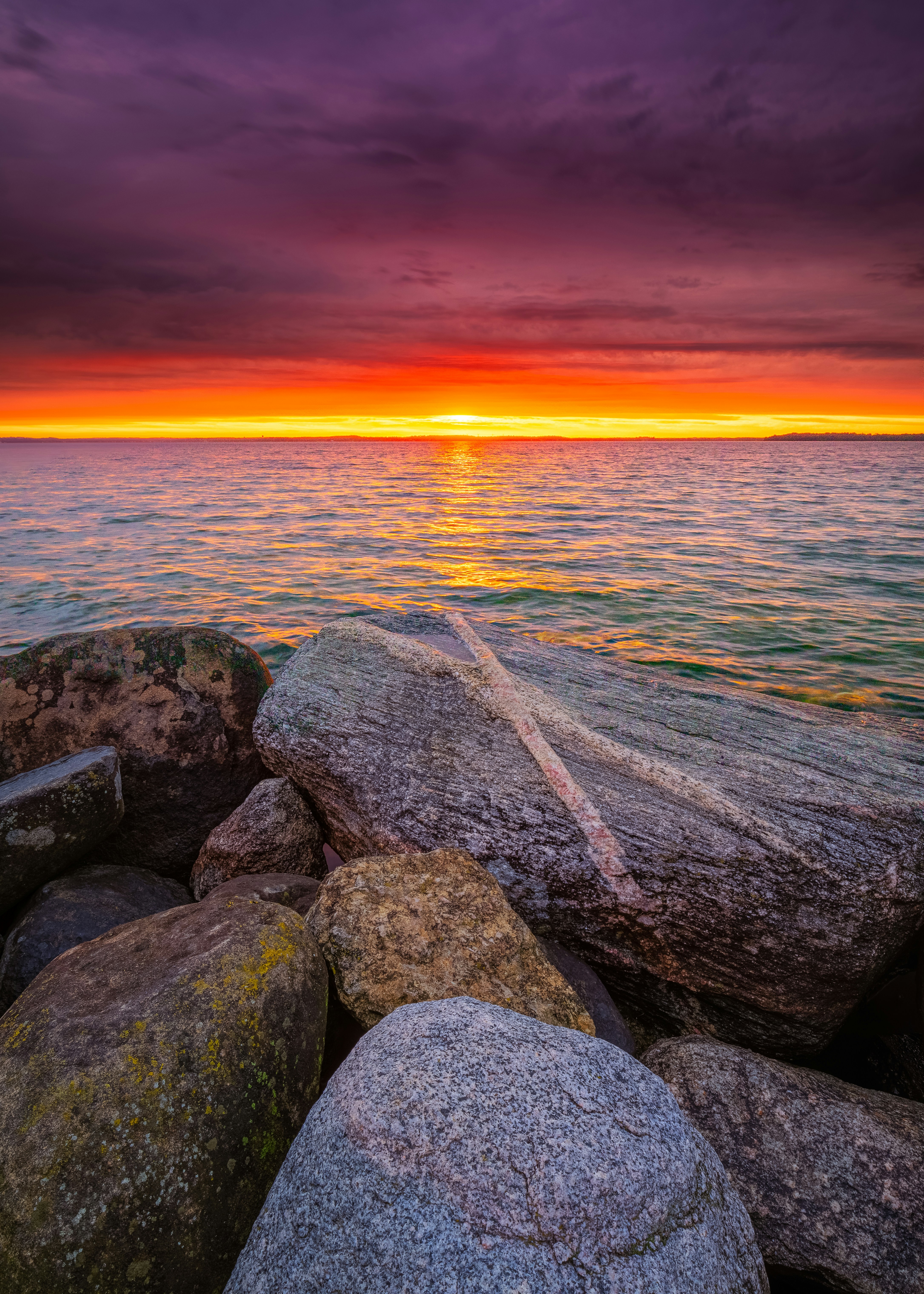 Sunset Over Sea at Rocky Shore