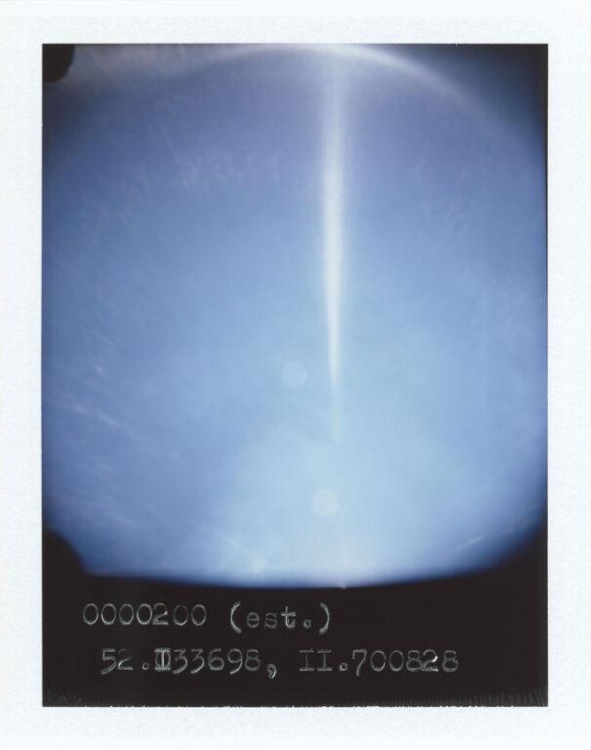 Polaroid of Blue Sky with Light Beam