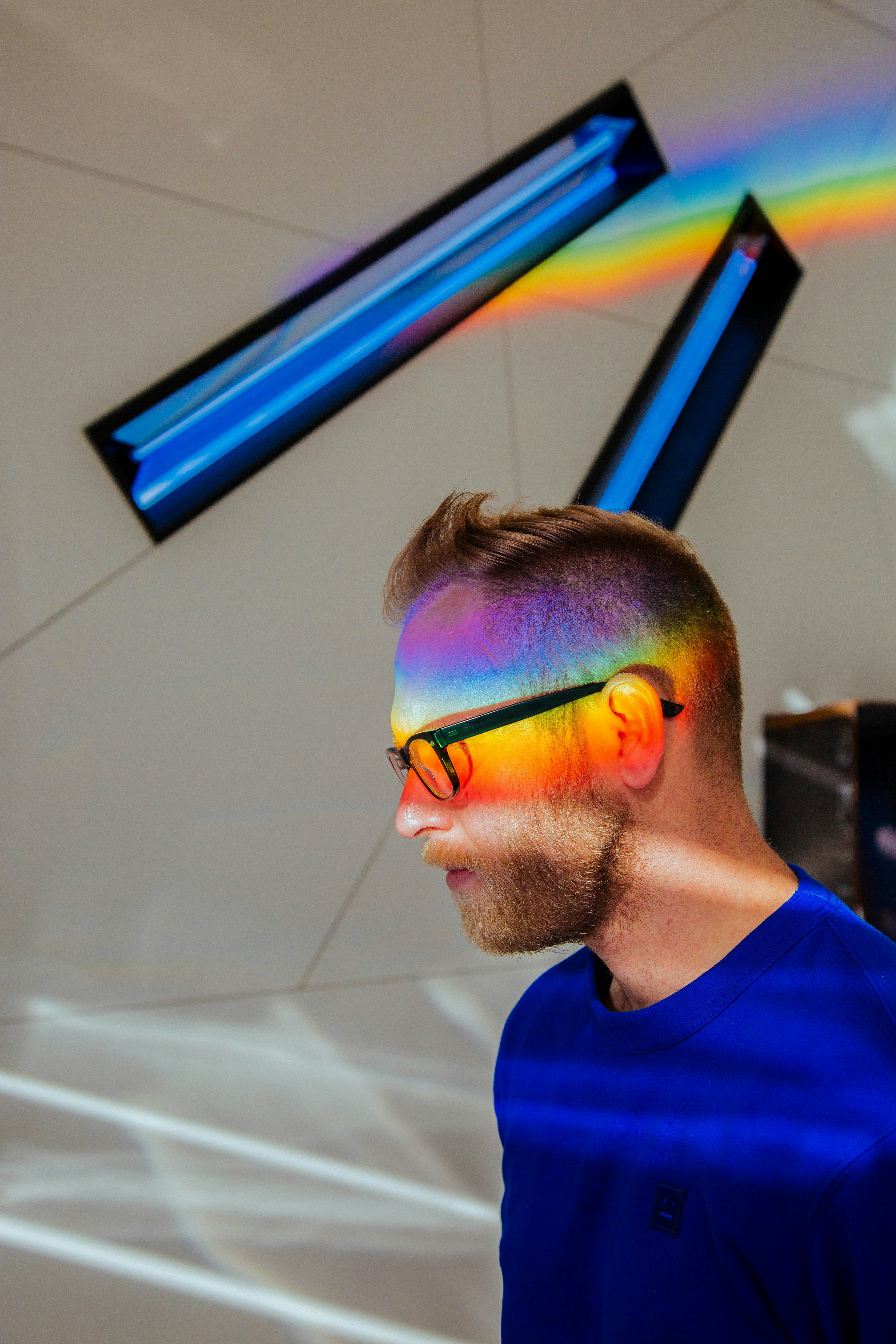 Man with Rainbow Light on His Face
