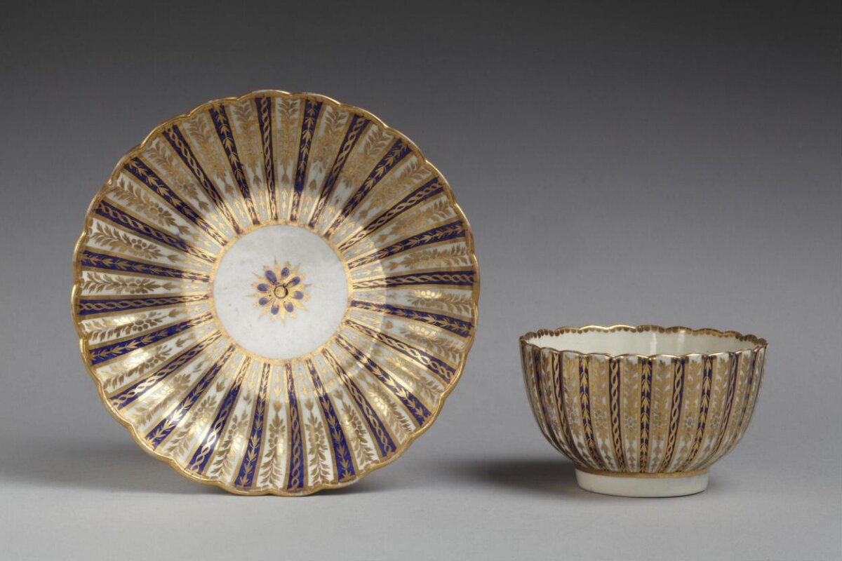 Blue and Gilded Porcelain Bowl and Saucer