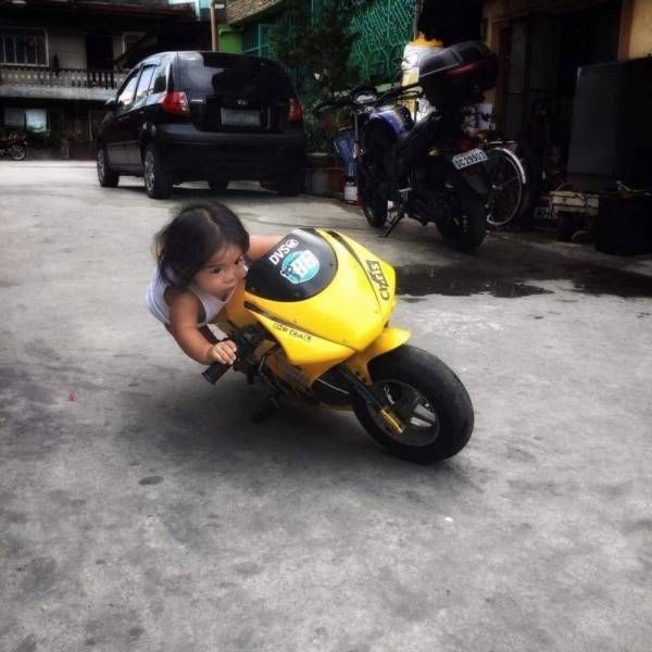 Toddler Riding Mini Yellow Motorcycle