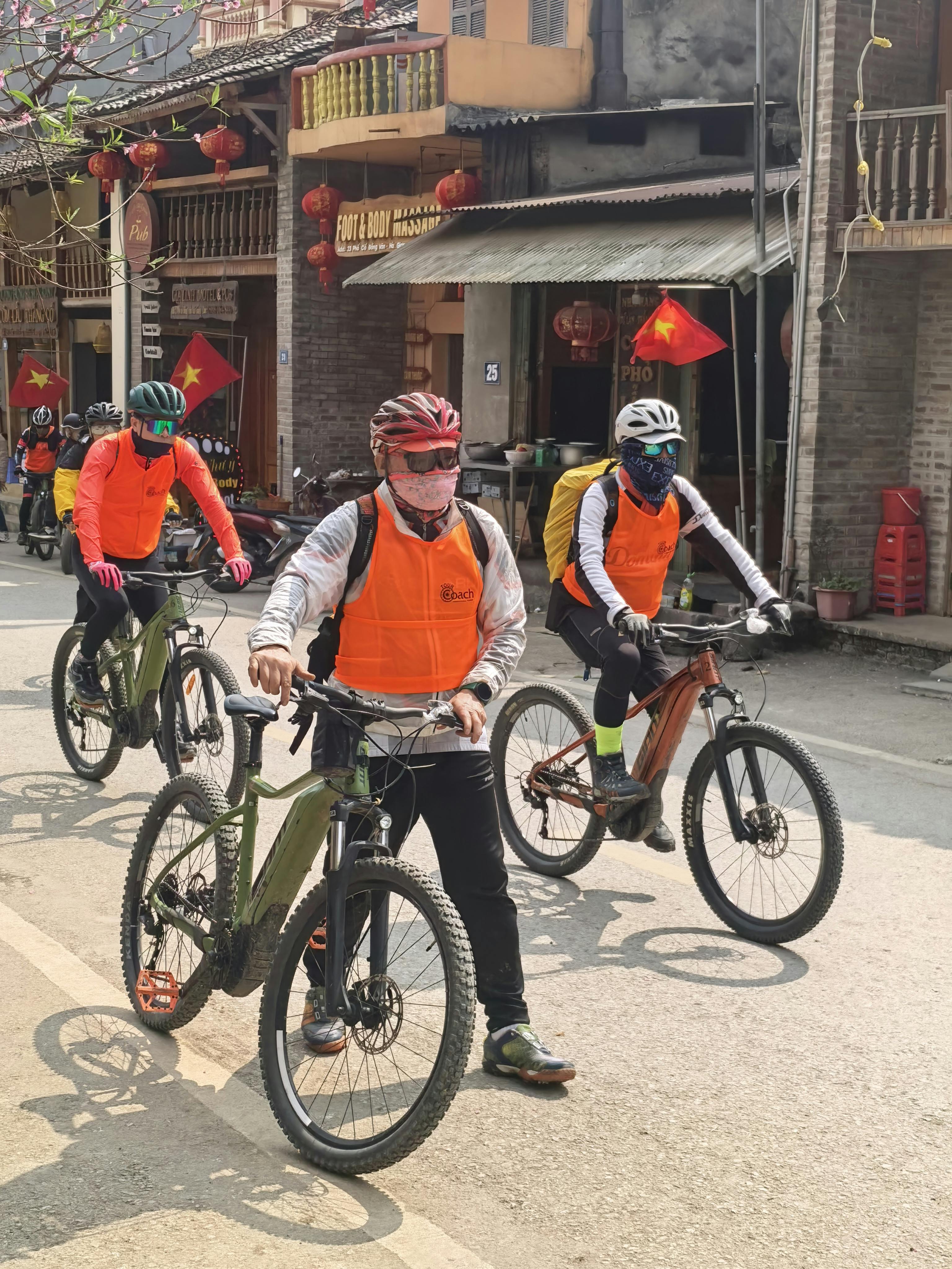 Cycling Tour Group on Town Street
