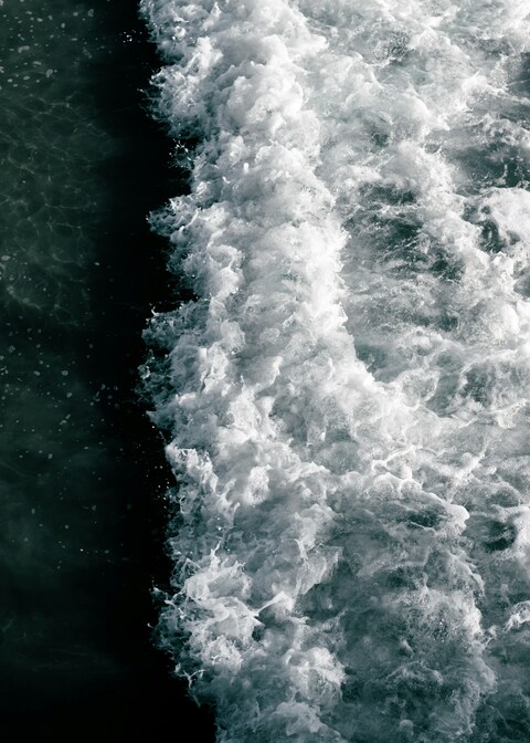 Boat Wake Foam on Dark Sea