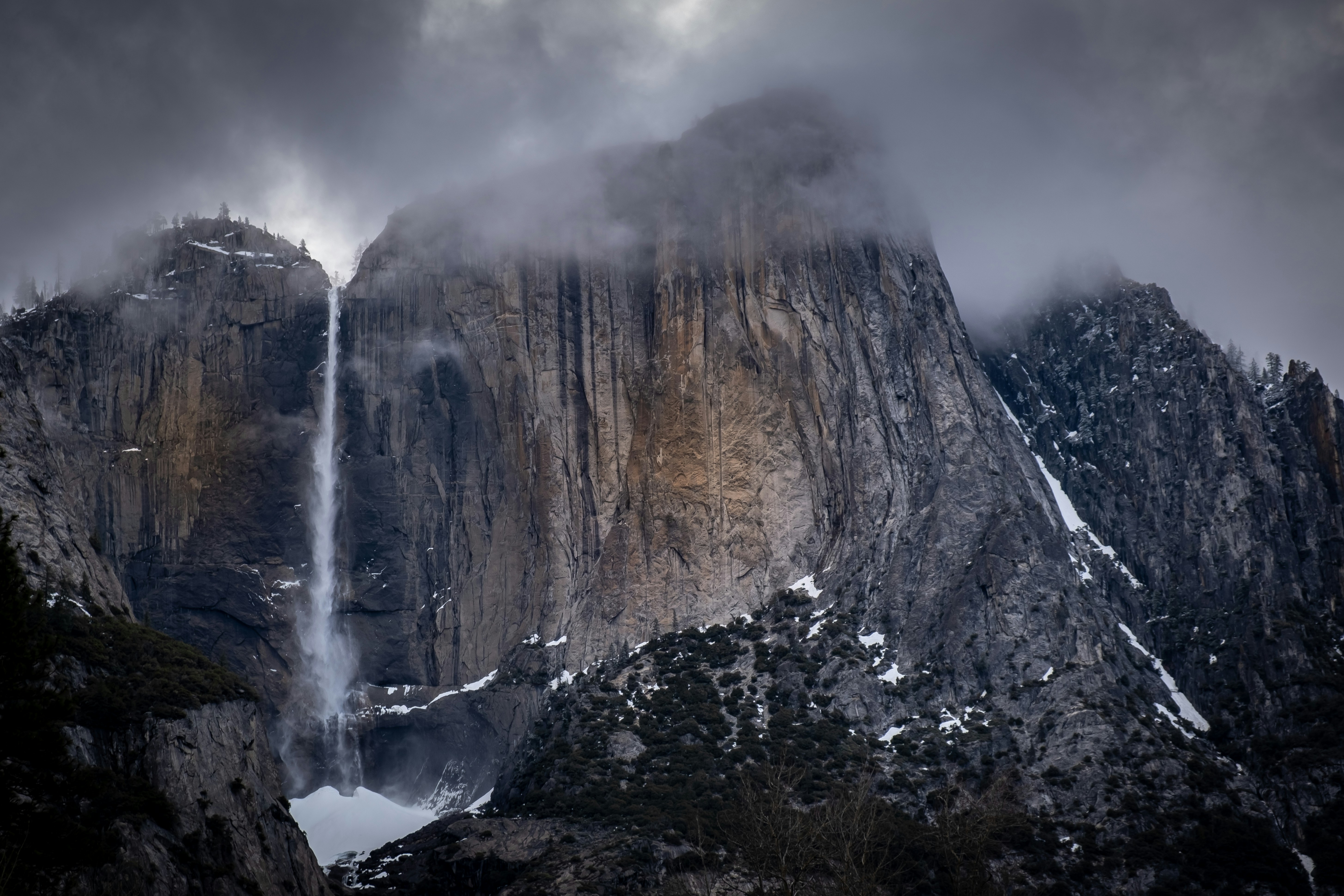 Foggy Cliffside Waterfall