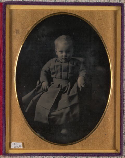 Vintage Portrait of Seated Toddler