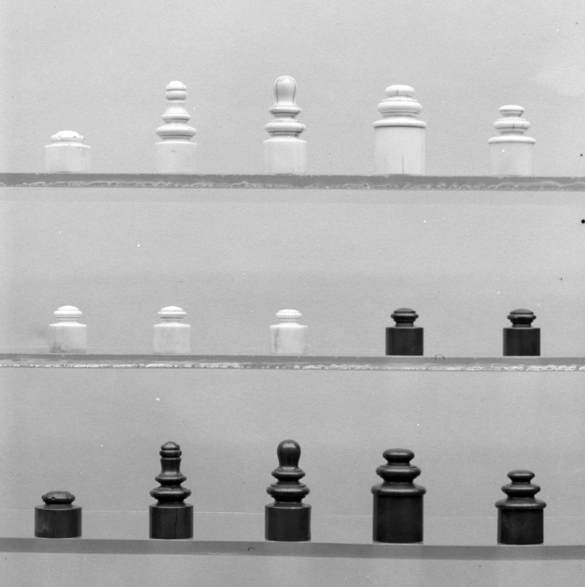 Three Rows of Arranged Chess Pieces