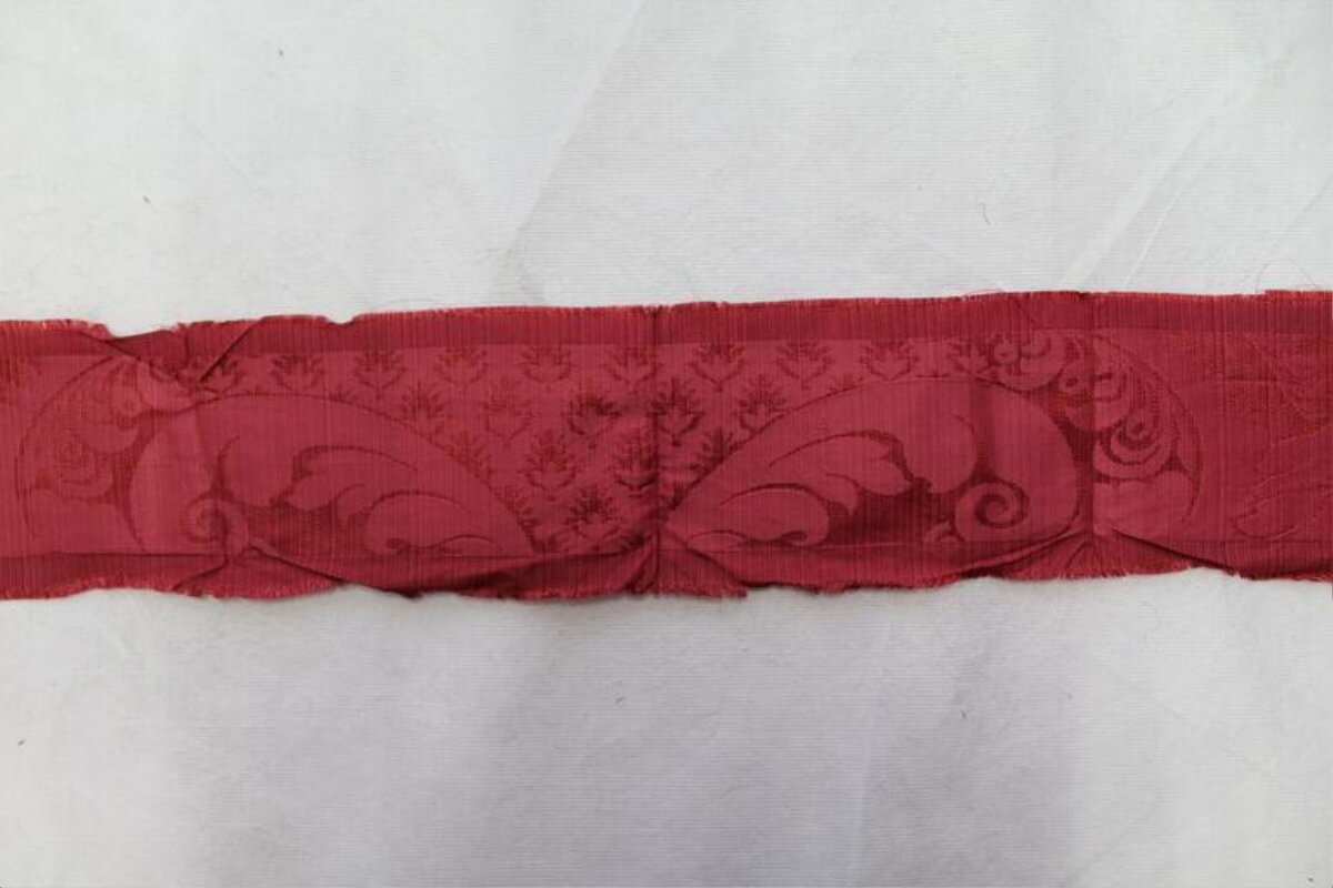 Red Ancient Patterned Fabric Fragment
