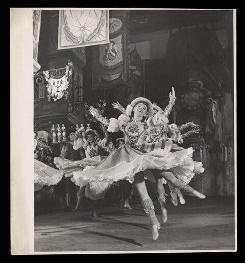 Ballet Dancers Leaping On Stage