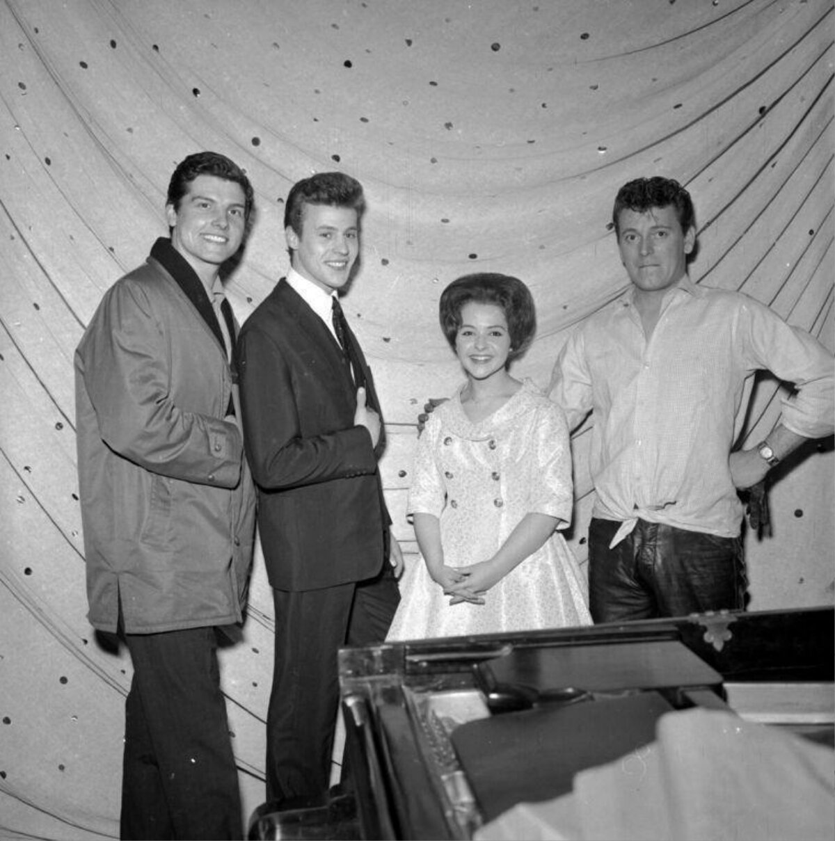 Four Entertainers Posing Backstage
