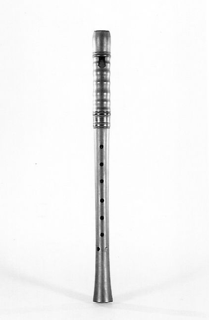 Metal Tin Whistle on White Background