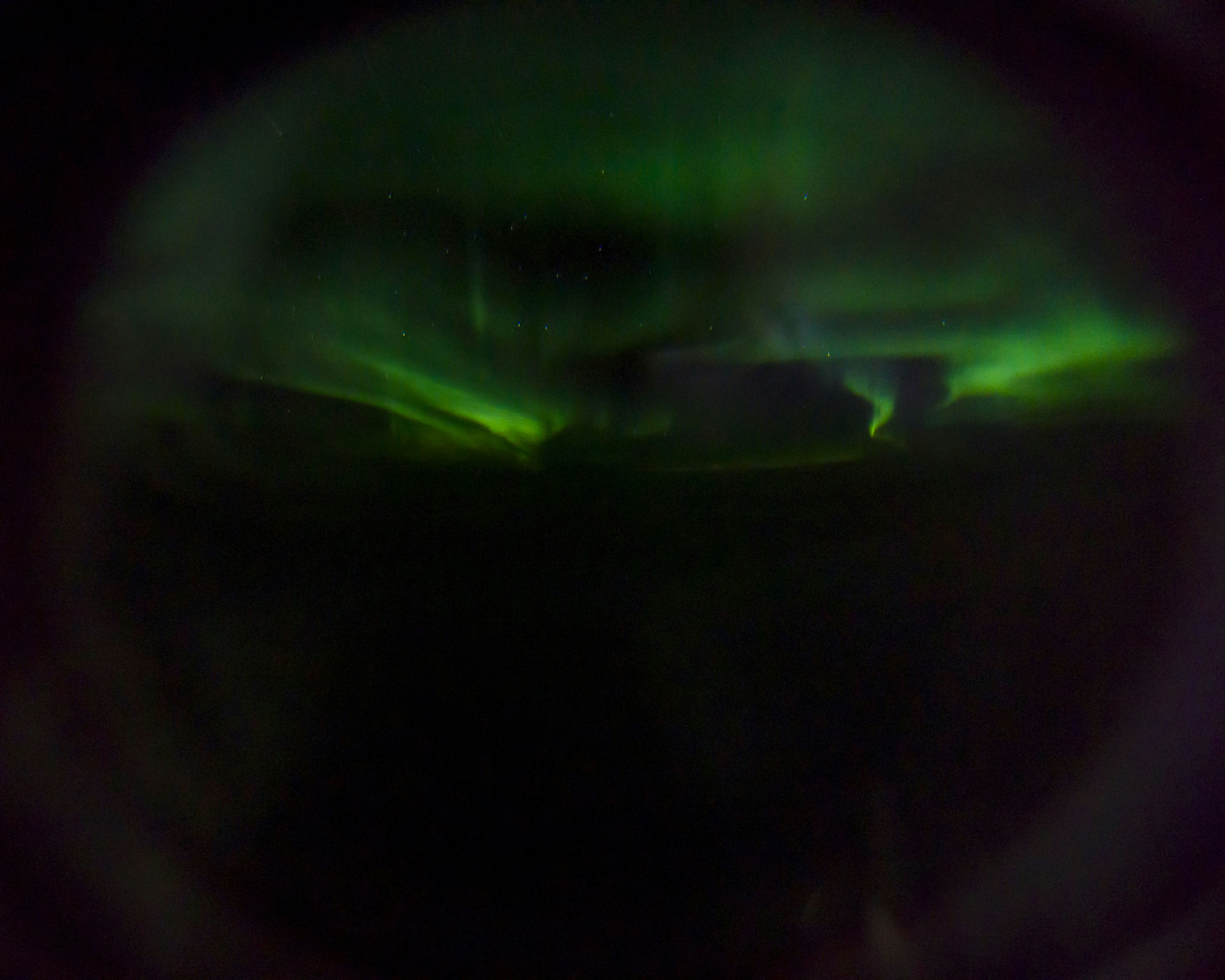 Green Aurora Over Night Sky