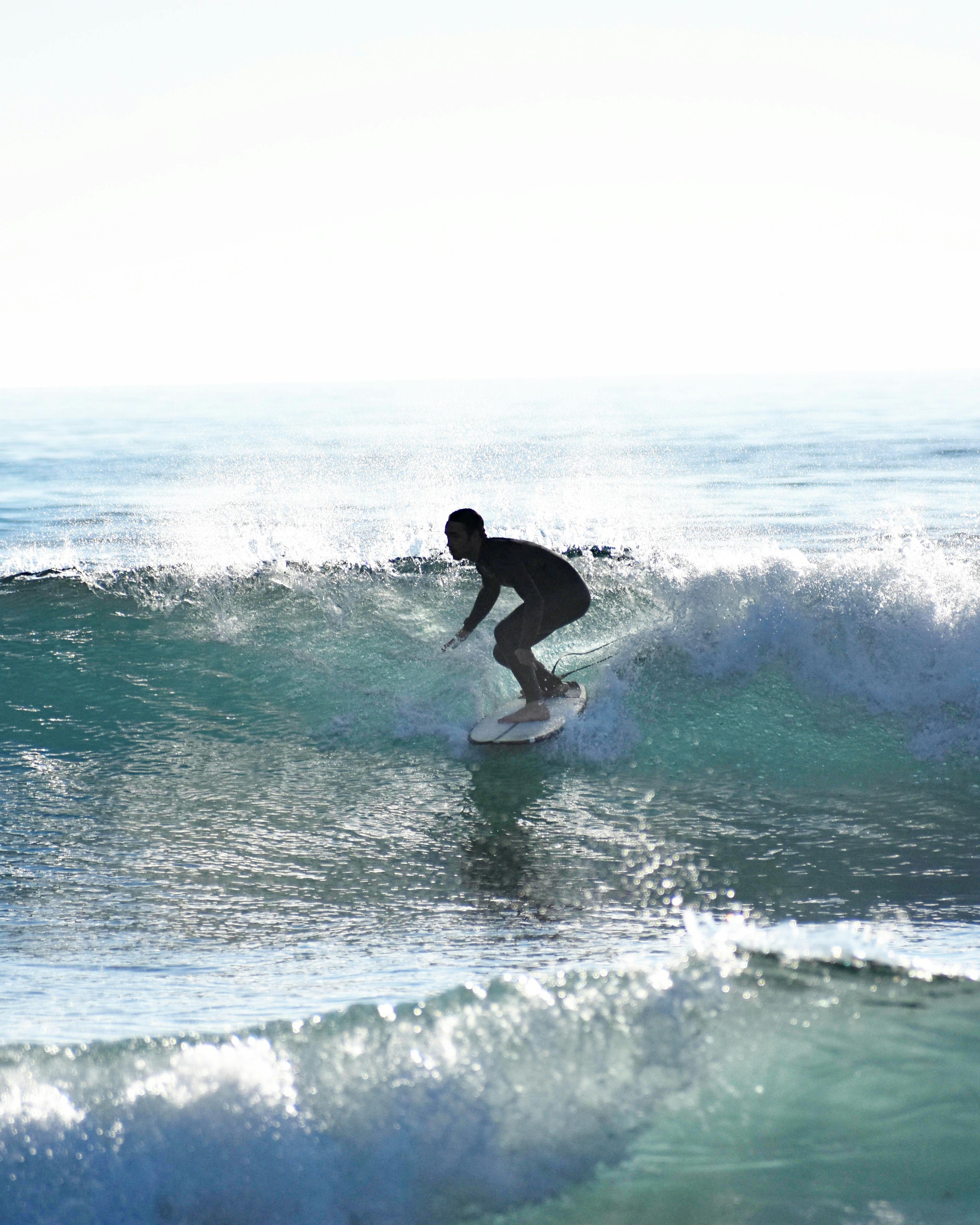 Surfer Riding Ocean Wave