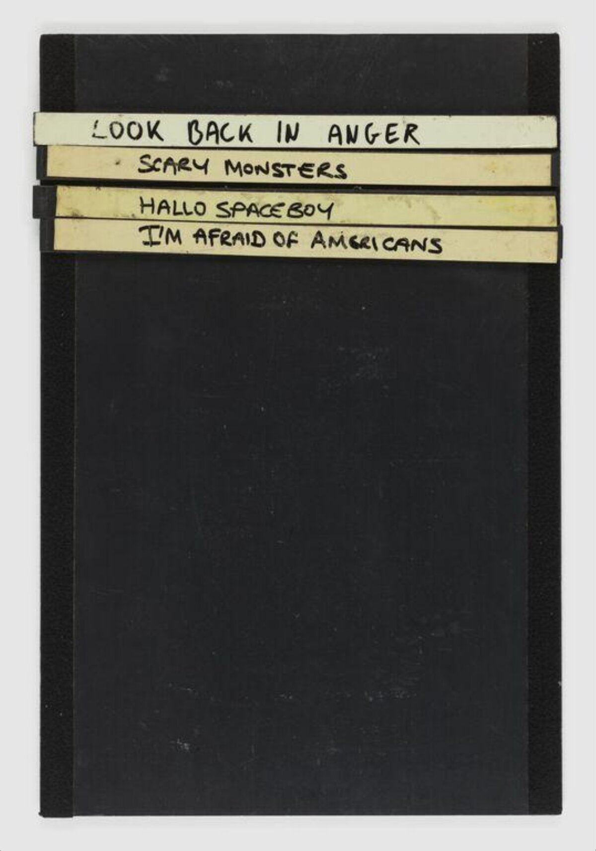 Binder with Handwritten Track Titles