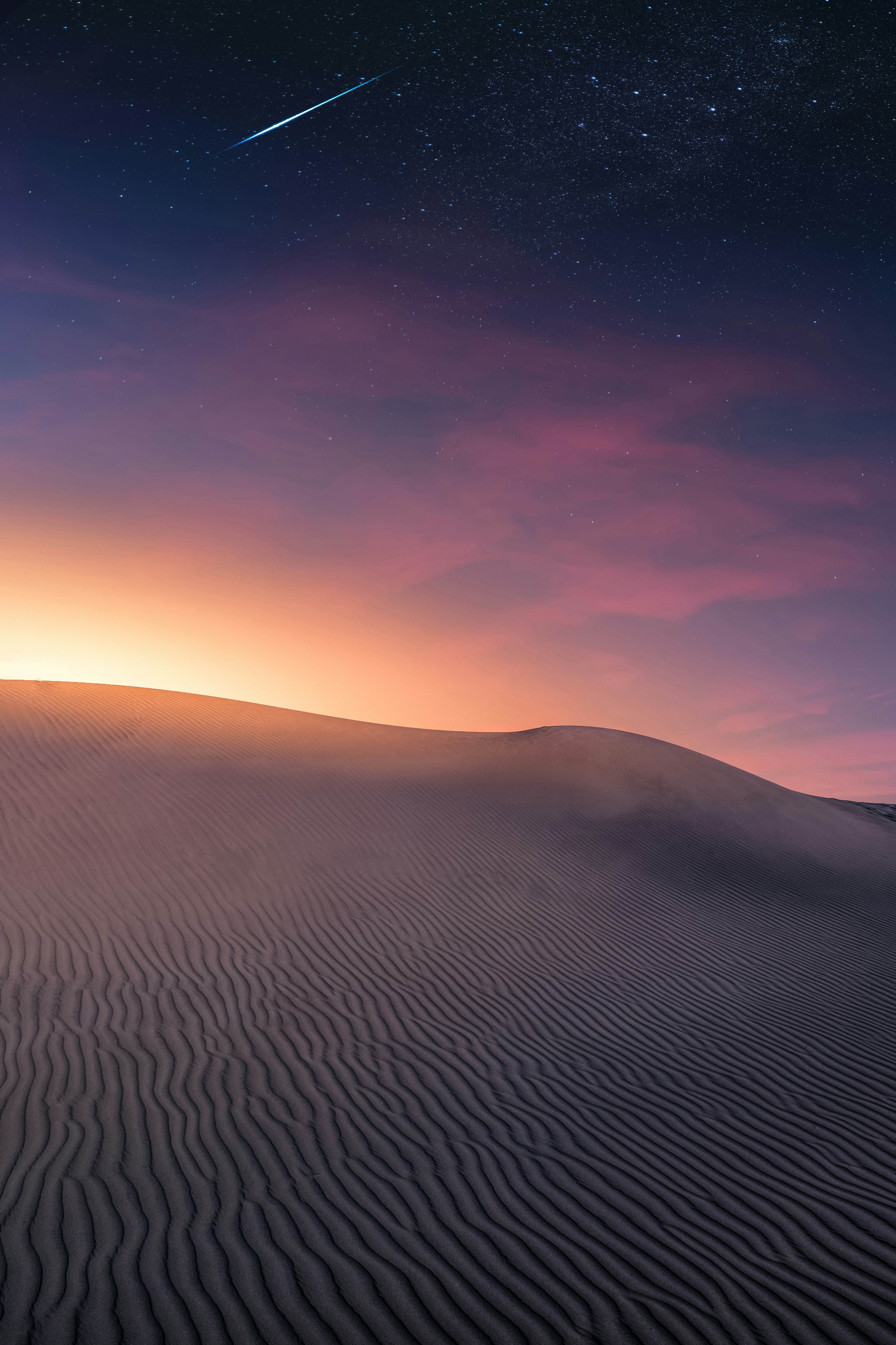 Desert Dunes with Meteor Over Starry Sky