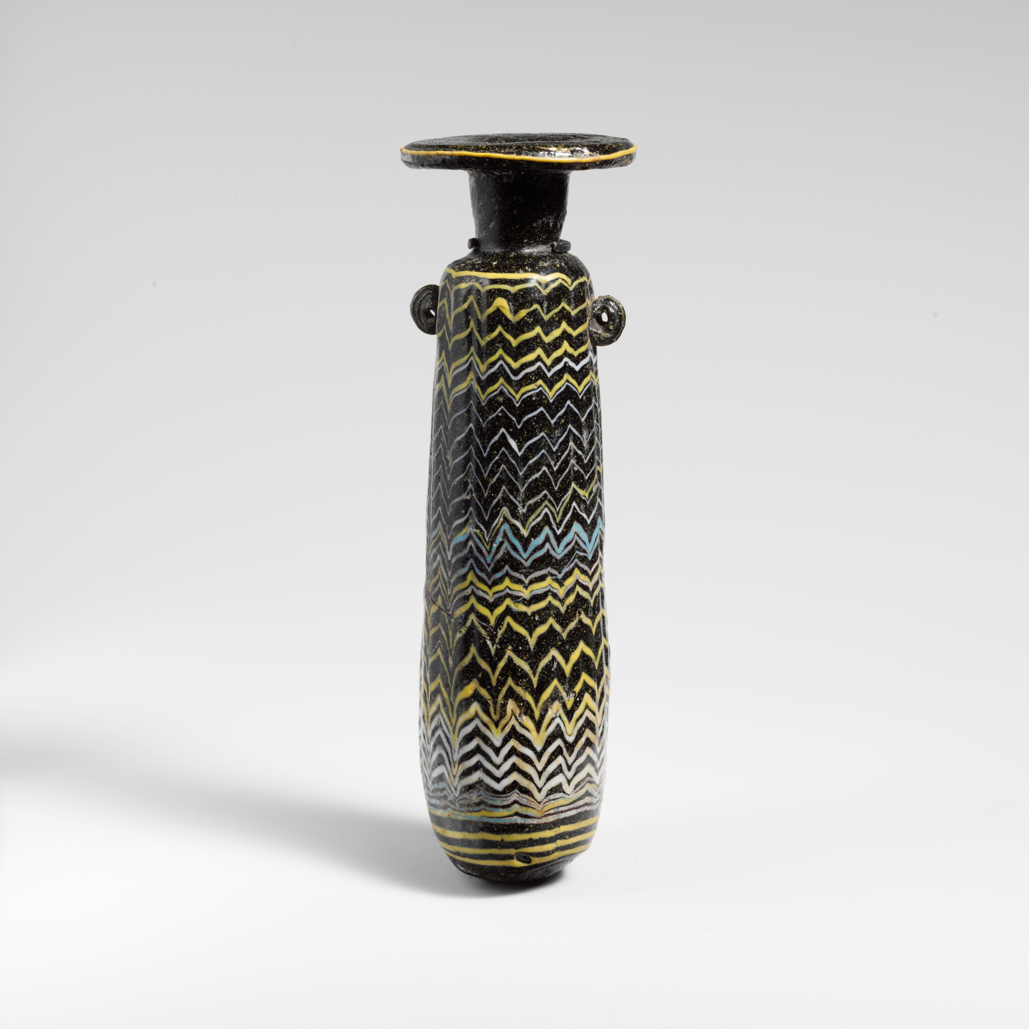 Ancient Patterned Glass Bottle