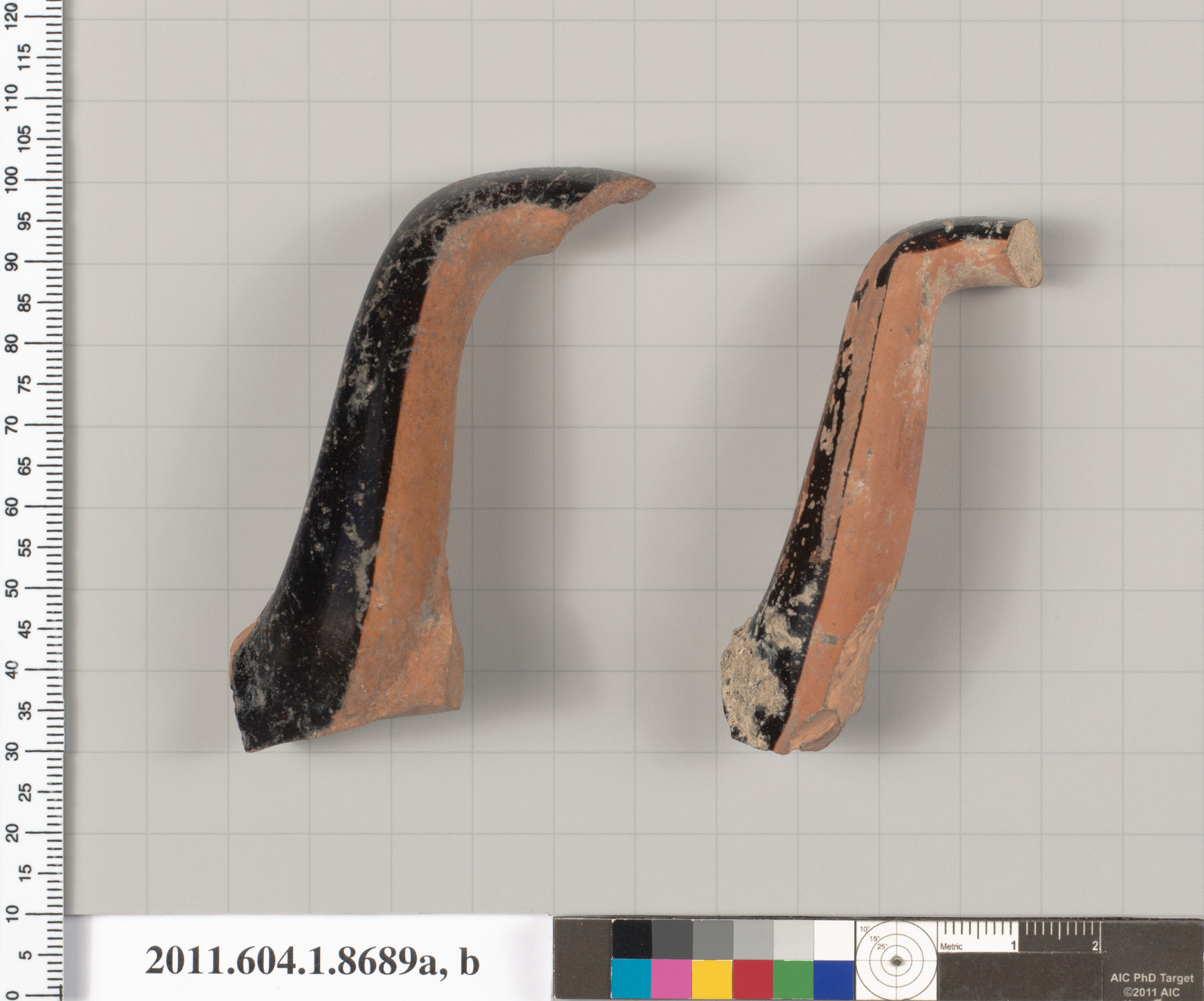 Two Ancient Pottery Handle Fragments