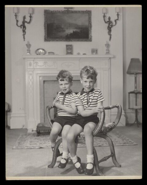 Two Young Boys in Matching Outfits