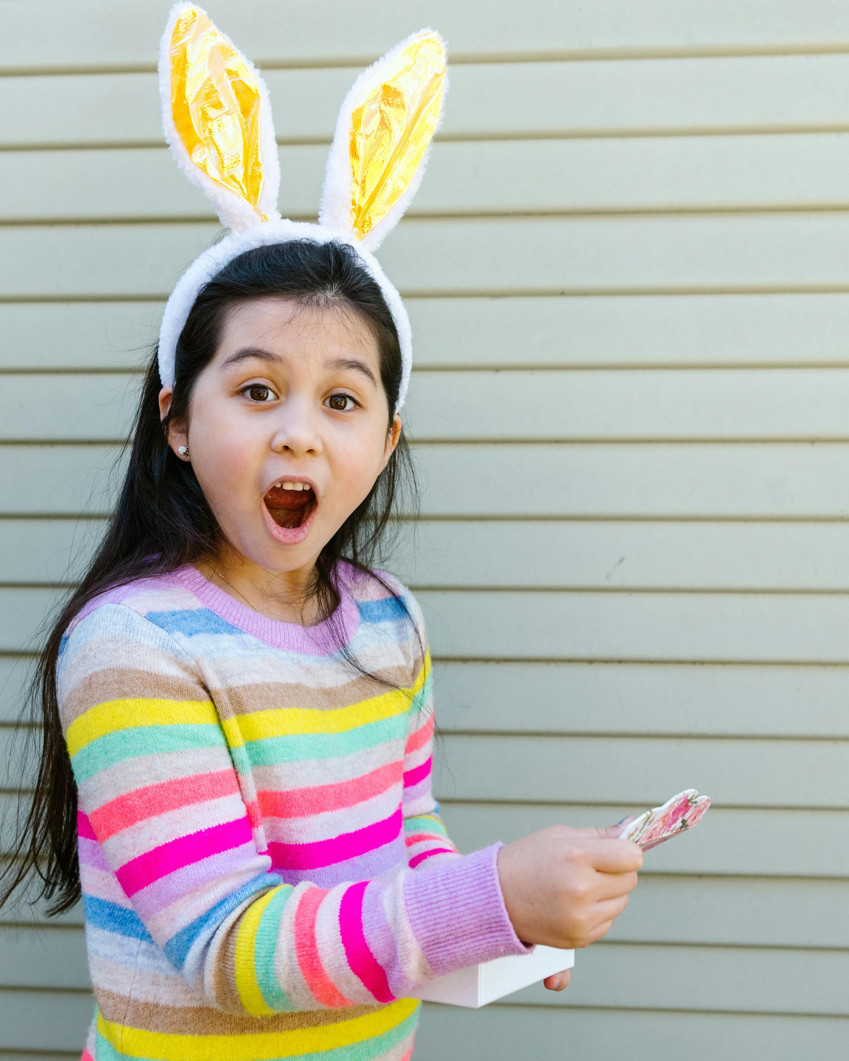 Excited Girl Wearing Easter Bunny Ears
