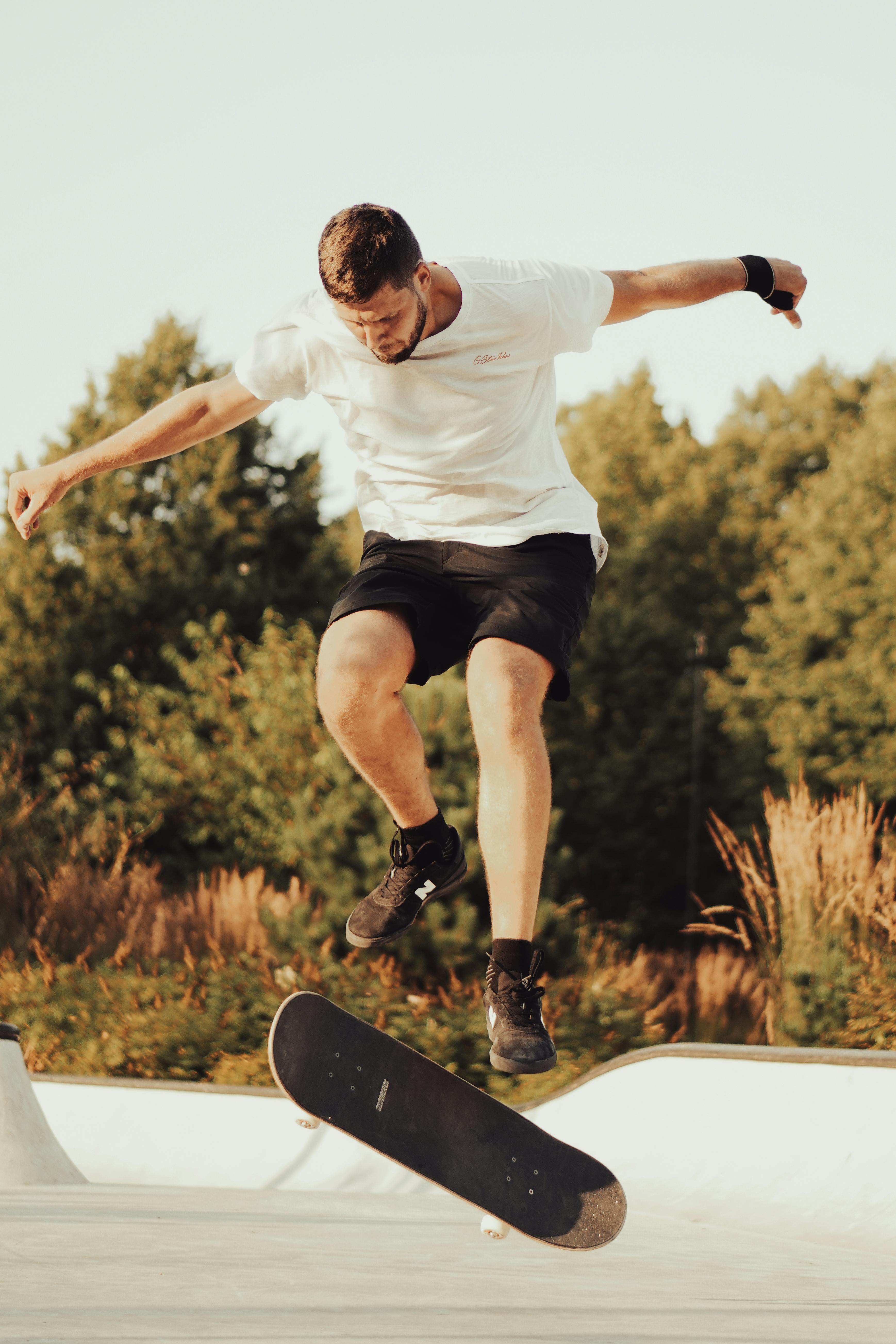 Skateboarder Performing Trick At Skatepark