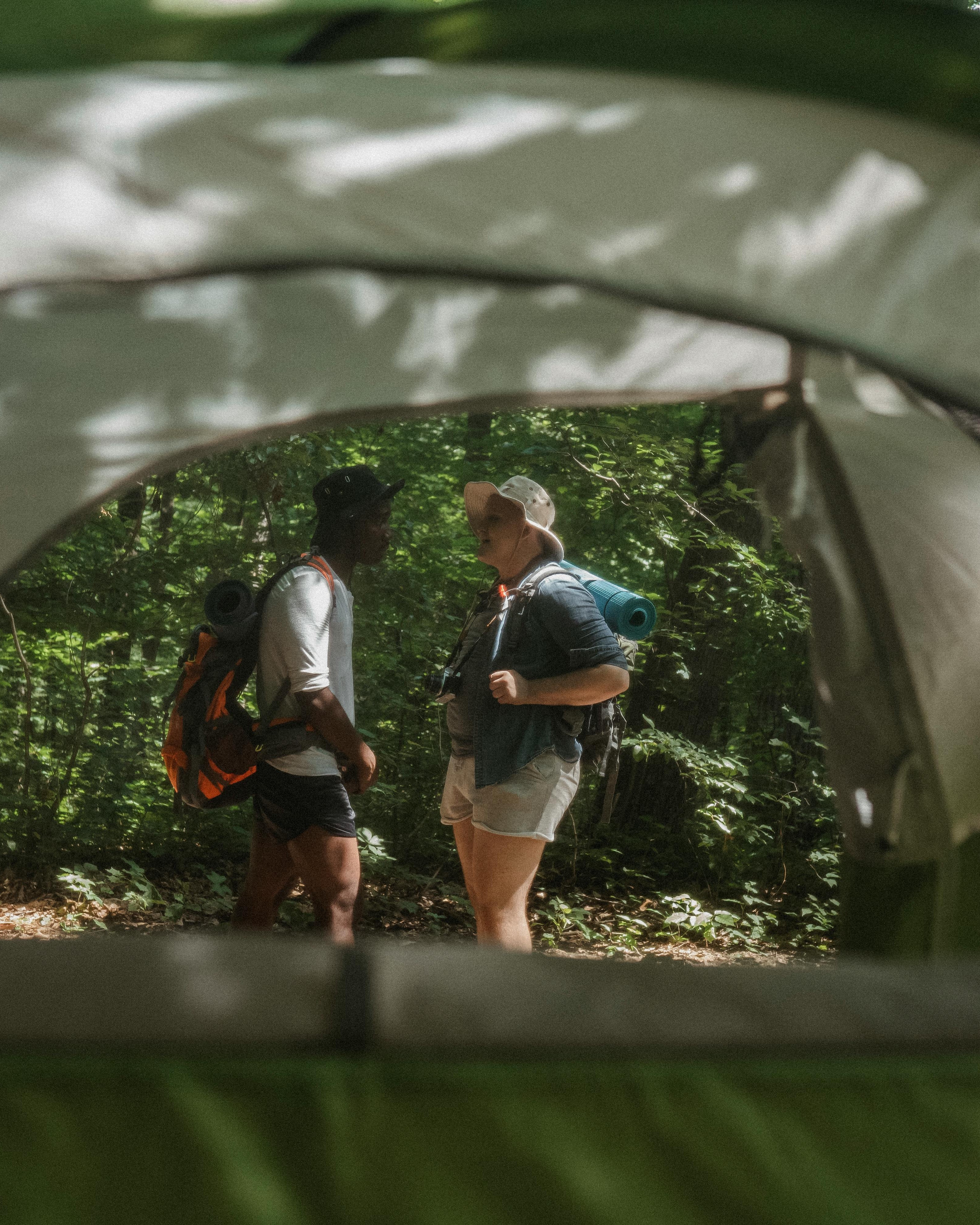 Two Hikers Viewed From Inside Tent