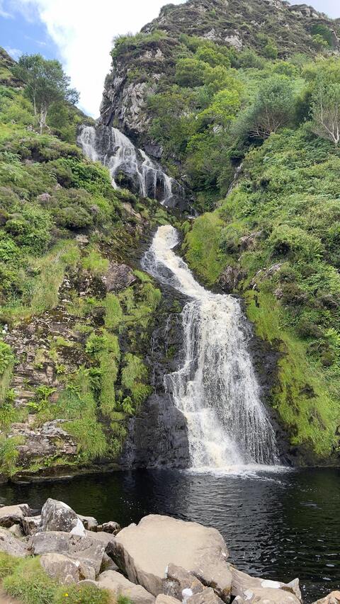 Cascading Hillside Waterfall