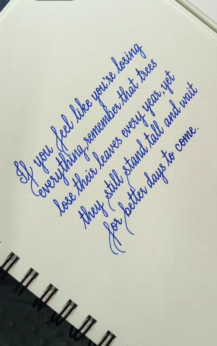 Handwritten Inspirational Quote on Notebook