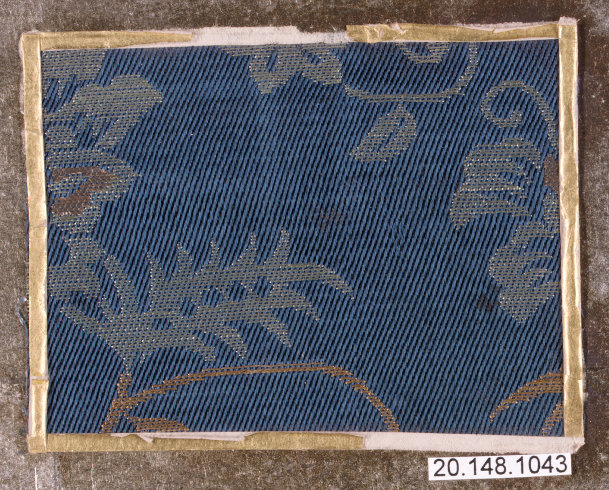 Blue Woven Pattern Textile Fragment