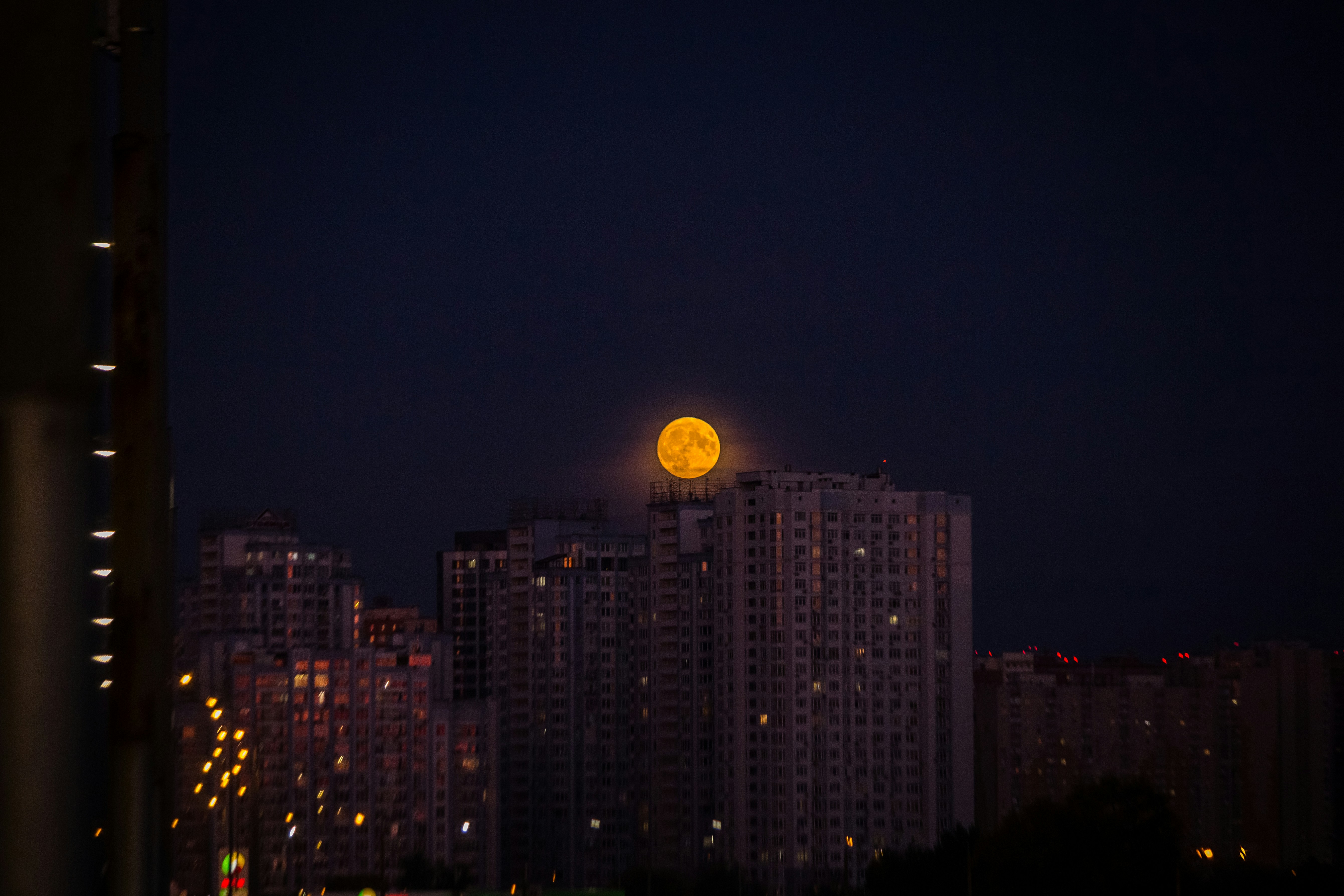 Full Moon Over City Nightscape