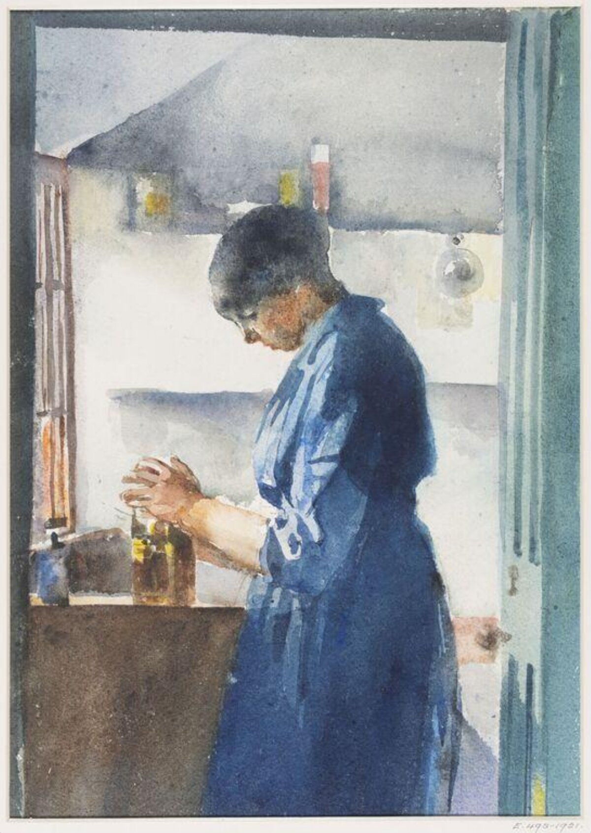 Woman Arranging Bottles at Counter