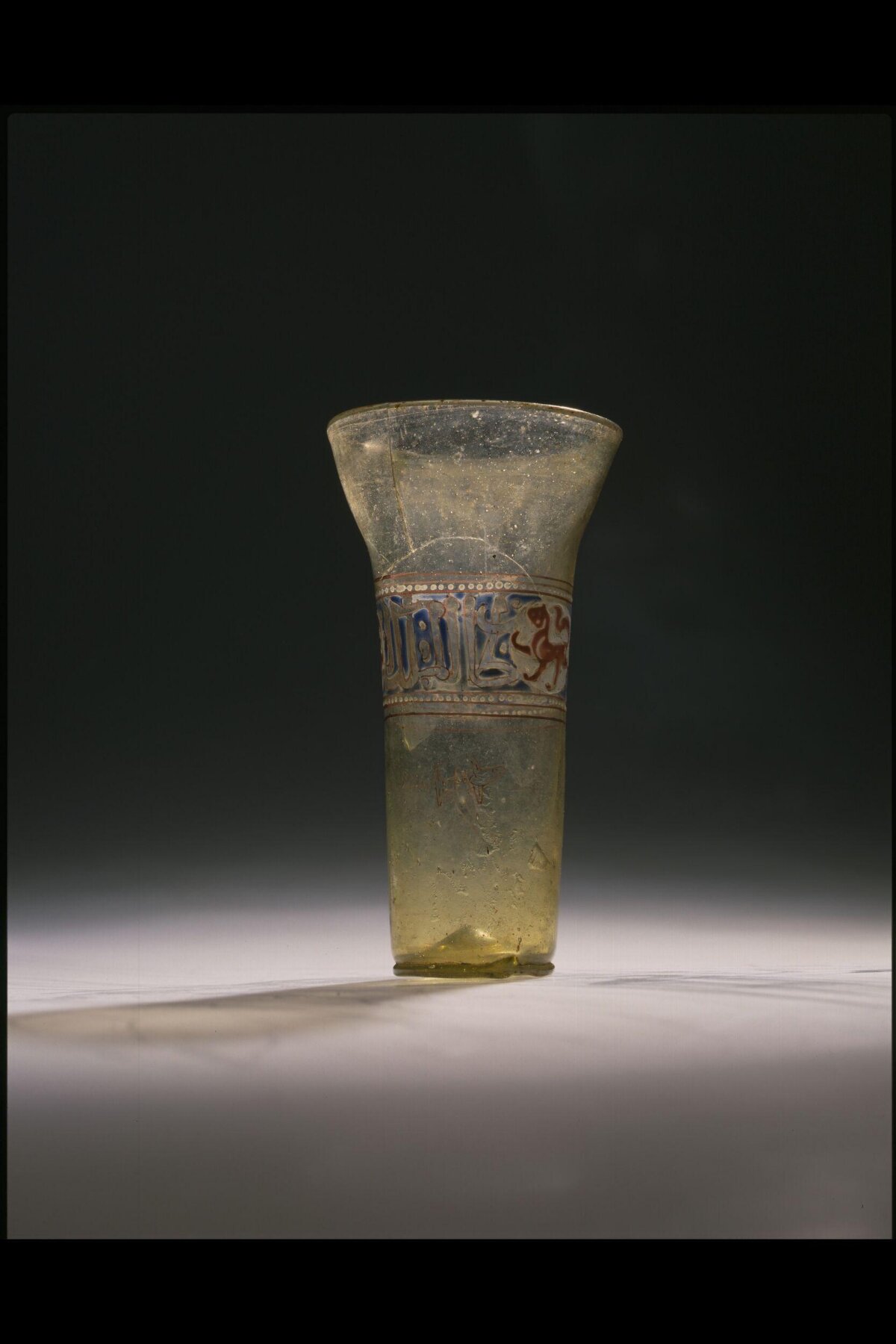 Ancient Decorated Yellow Glass Beaker