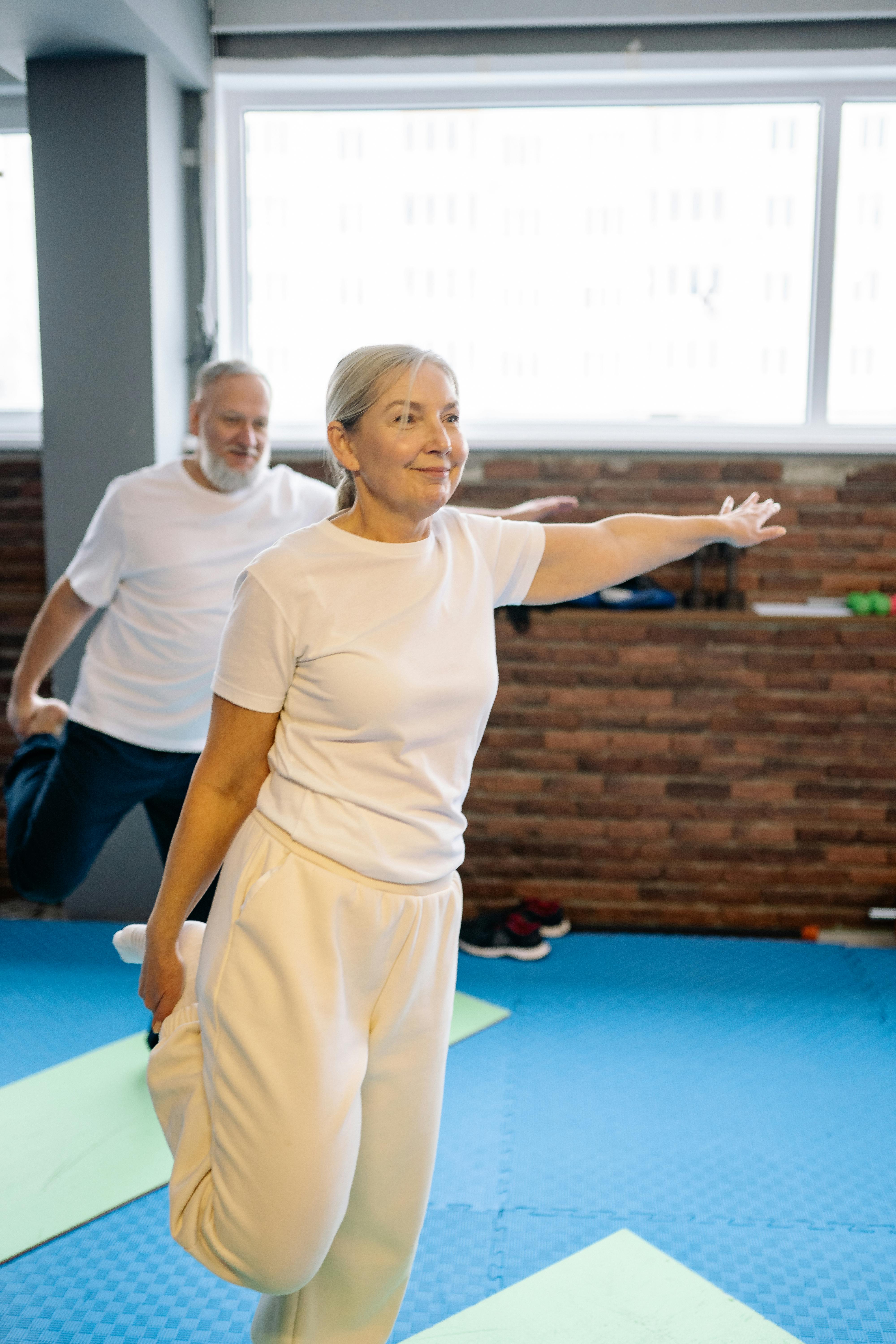 Two Seniors Doing Fitness Stretching