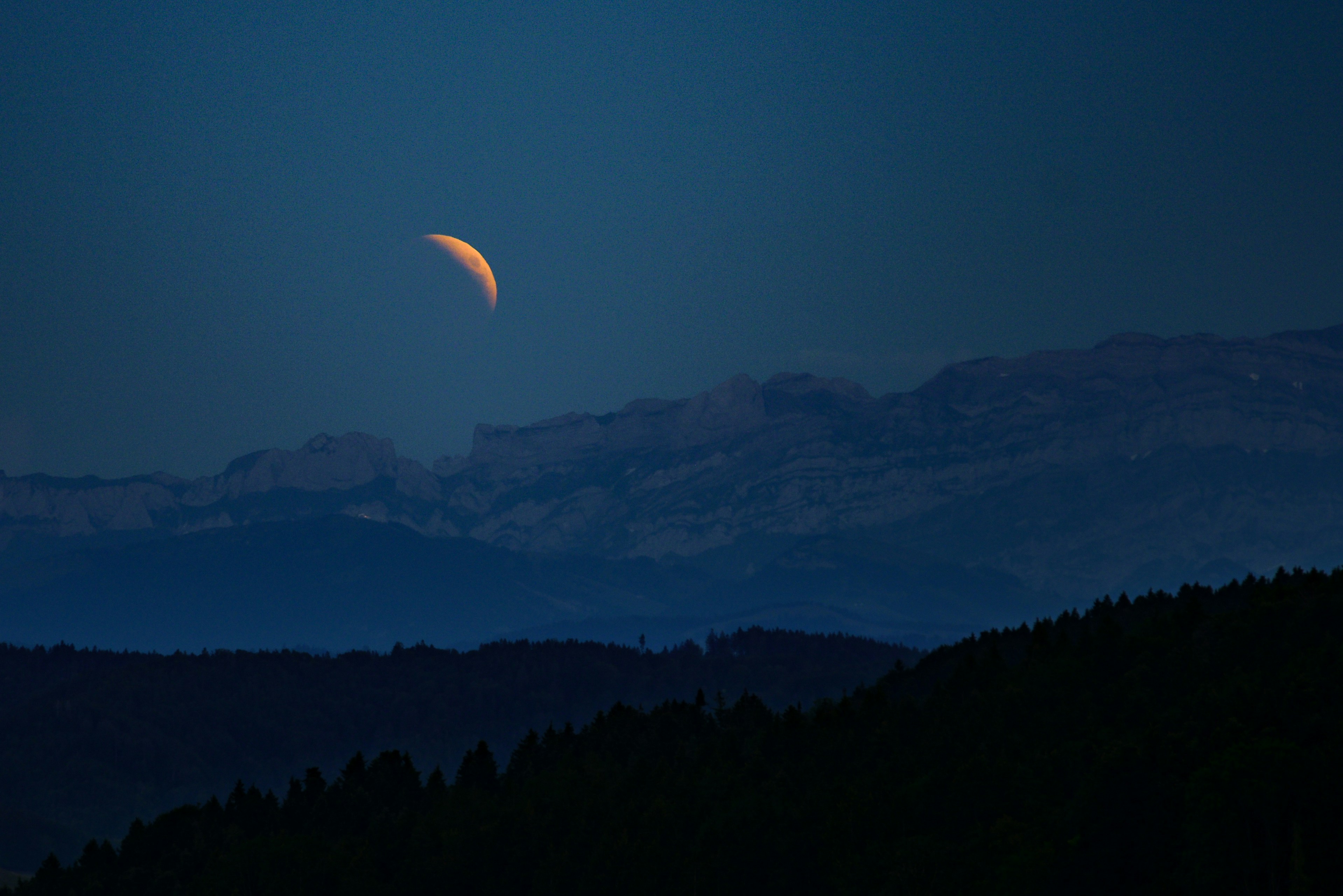 Crescent Moon Over Mountains