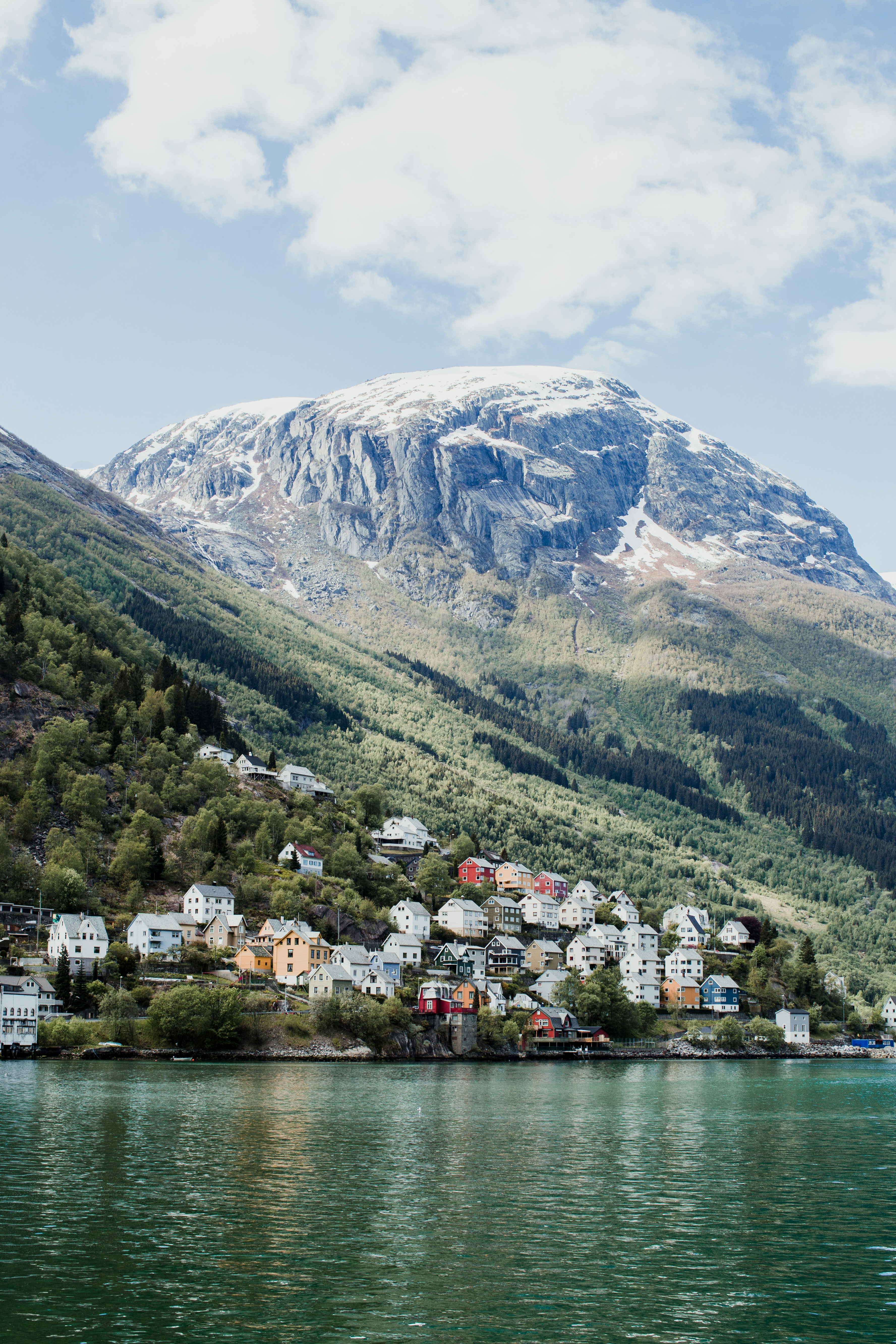 Fjord Village Under Snow Mountain