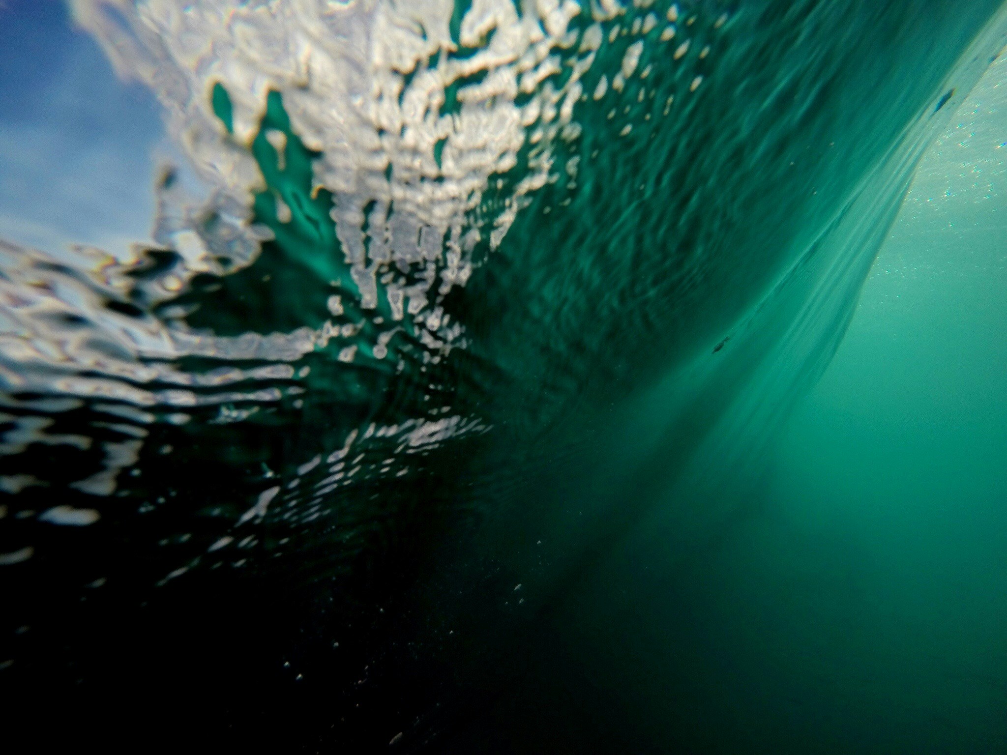 Underwater View of Curling Ocean Wave