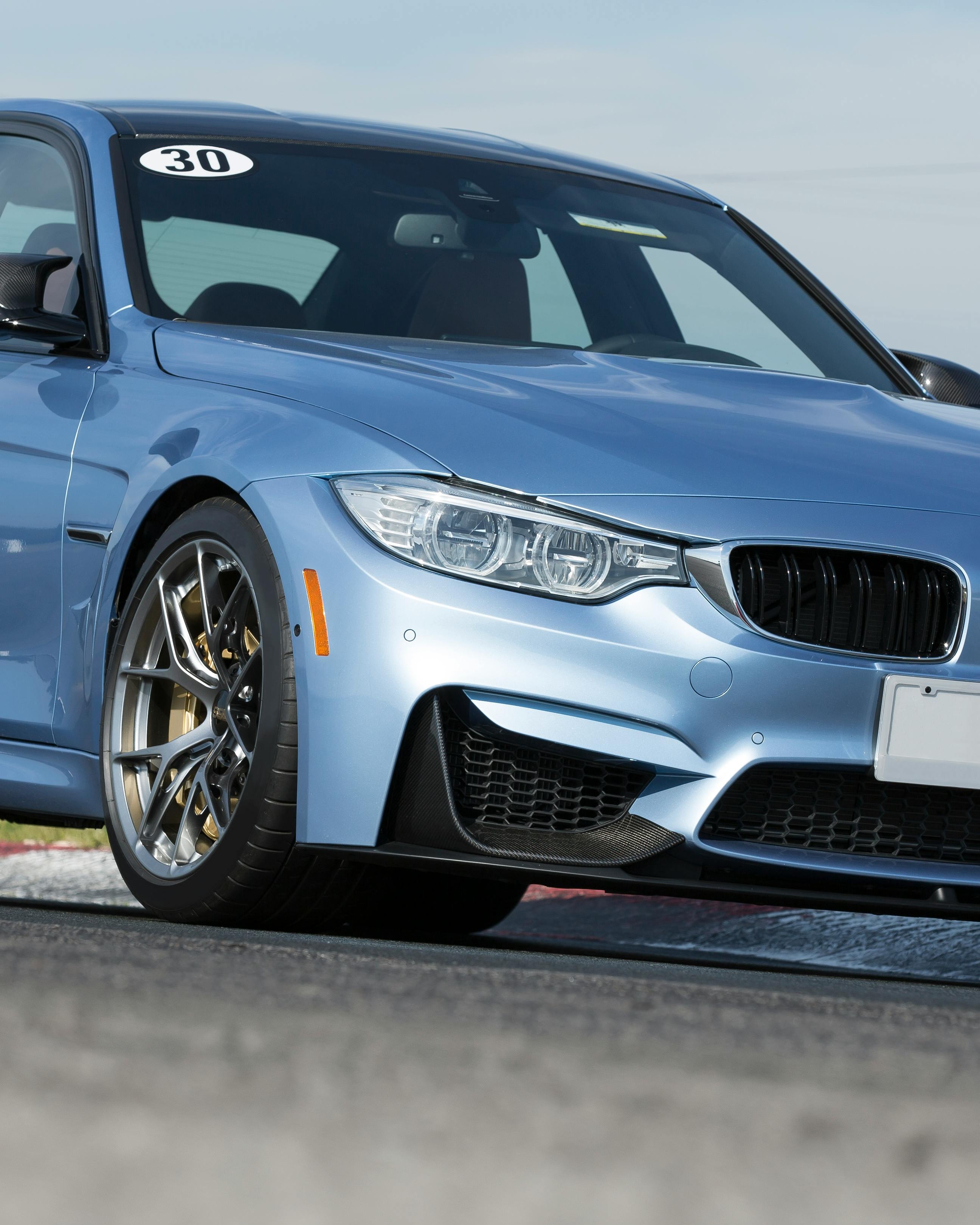 Light Blue BMW on Race Track