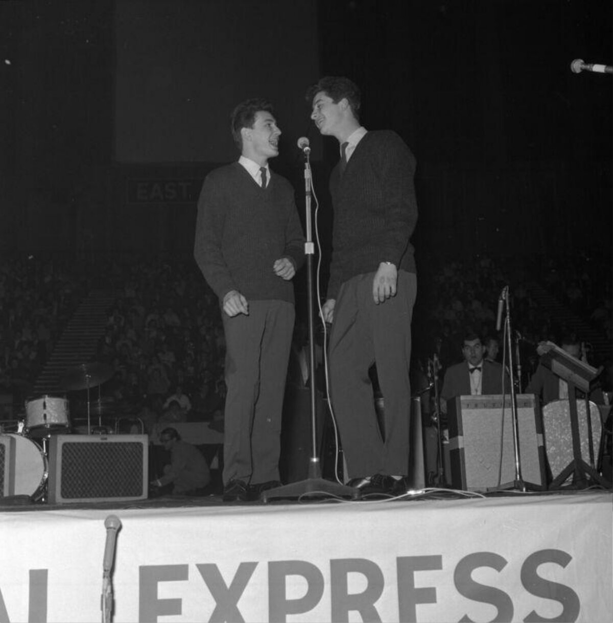 Two Vocalists Performing on Stage