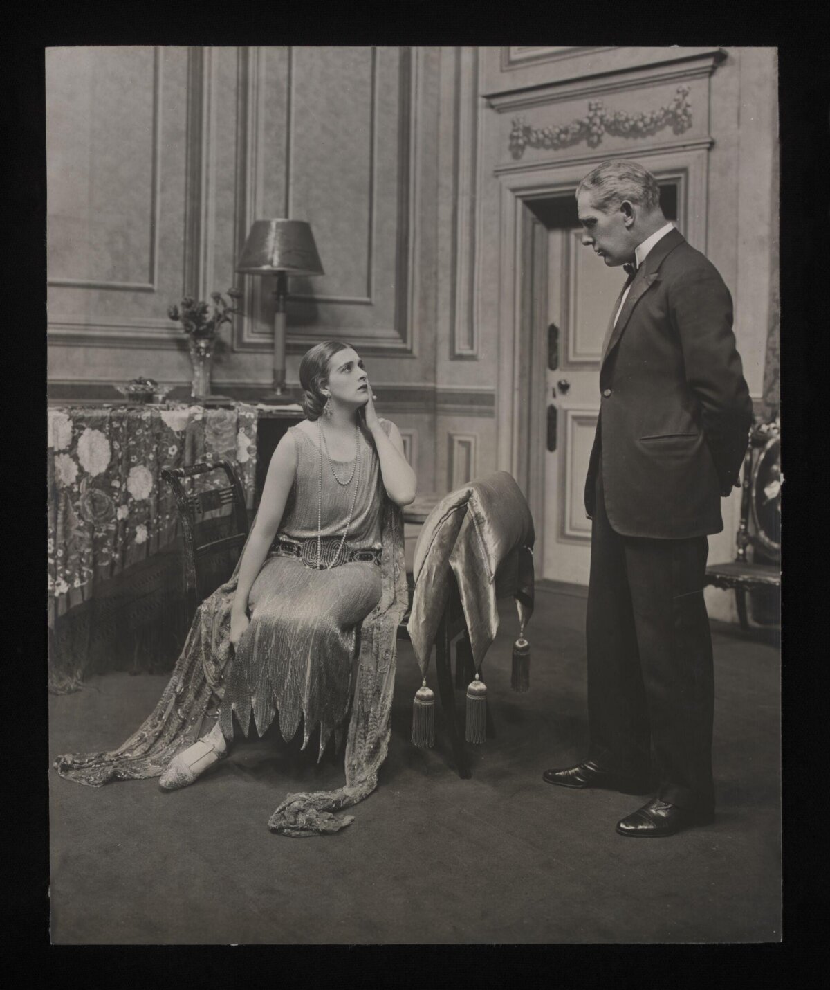 Vintage Stage Scene with Man and Woman